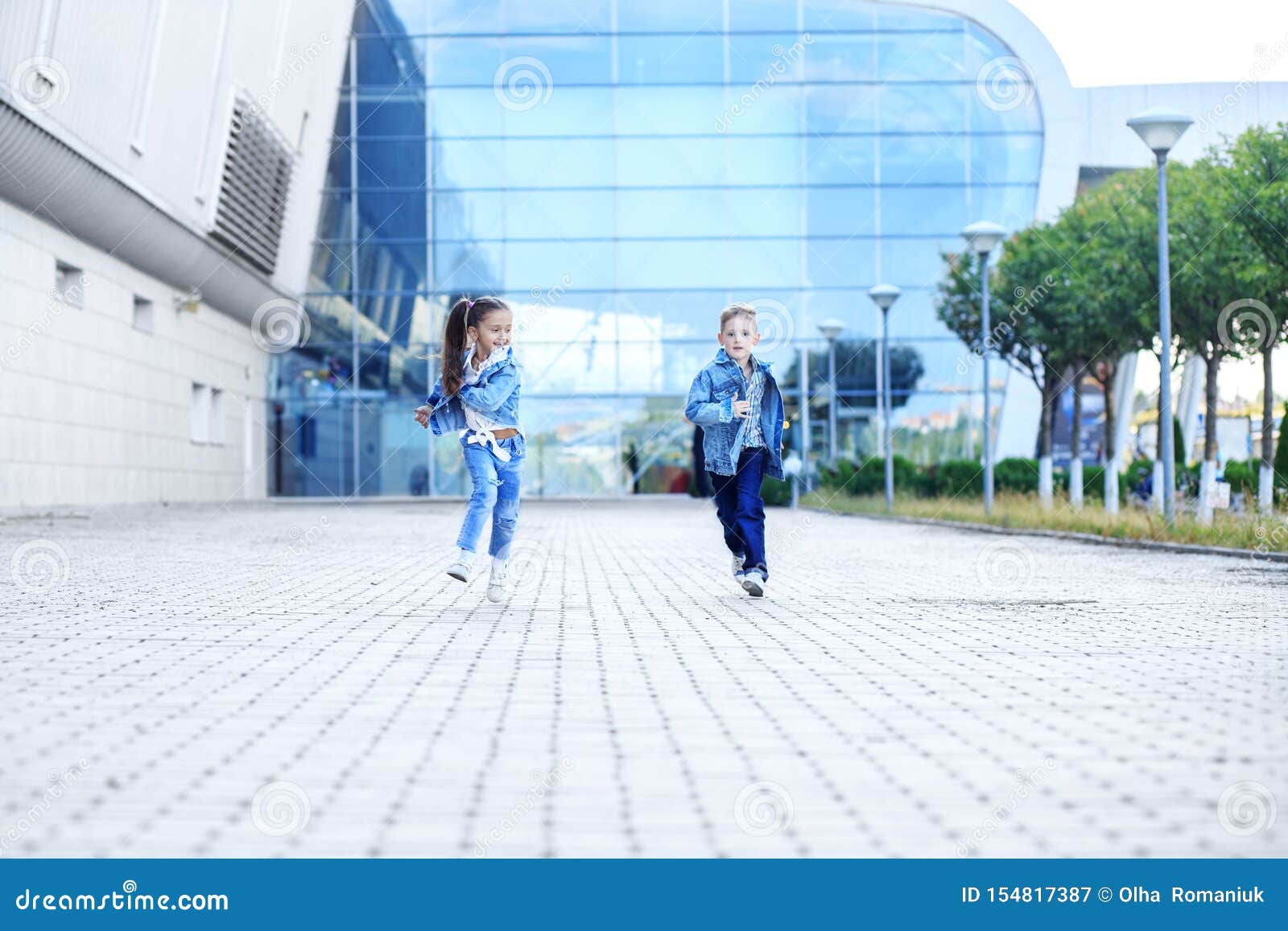 Little Boy and Girl Run Down the Street. the Concept of Childhood ...