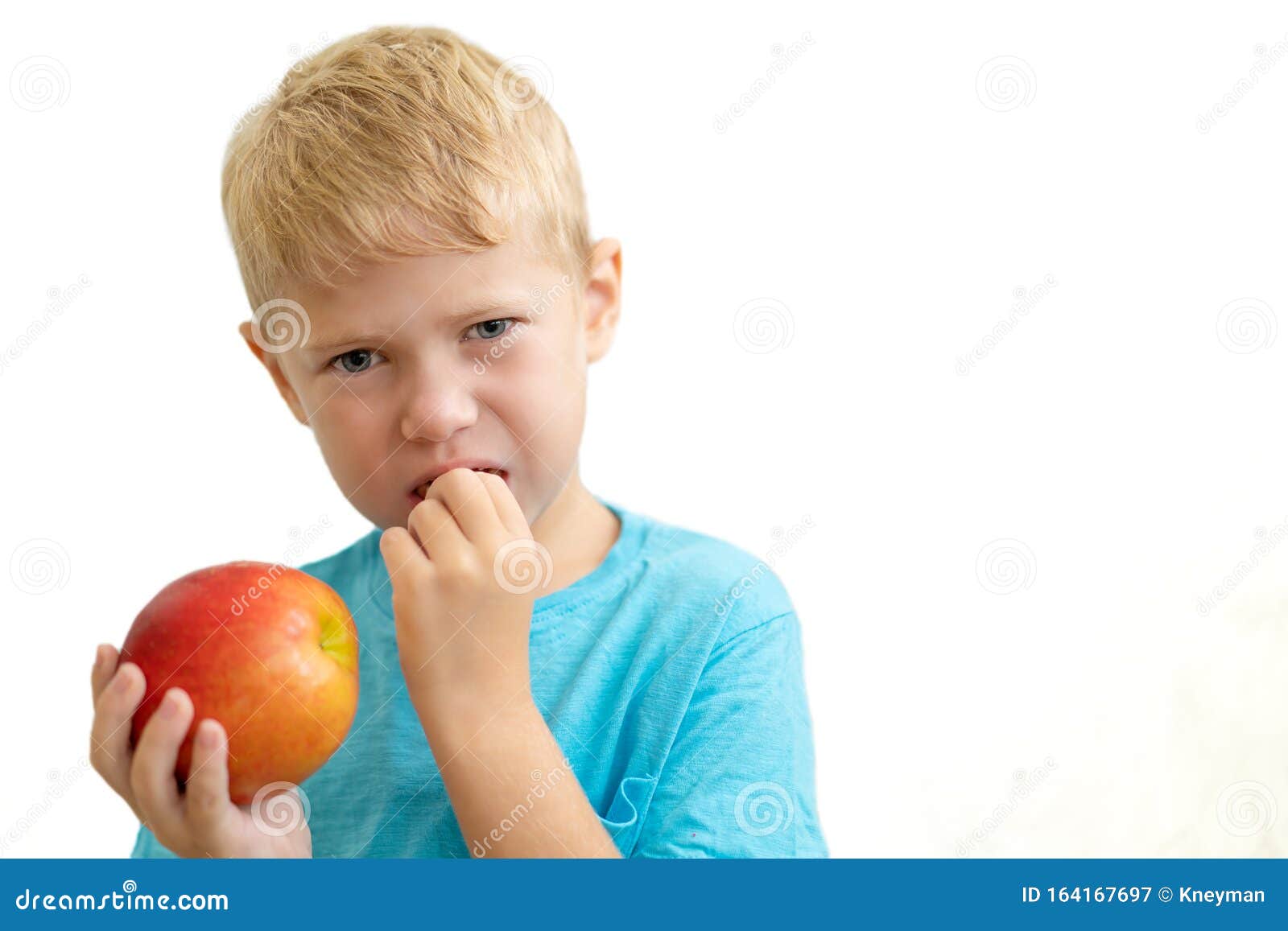 Little Boy Have Problem with His Teeth while Eat Apple. Concept