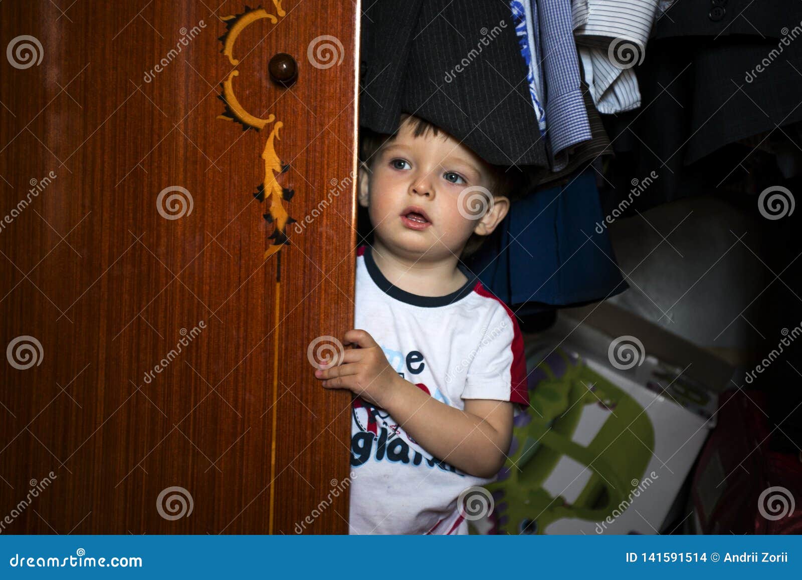 Little Boy Hiding Inside Wardrobe Stock Photo Image of inside, hiding