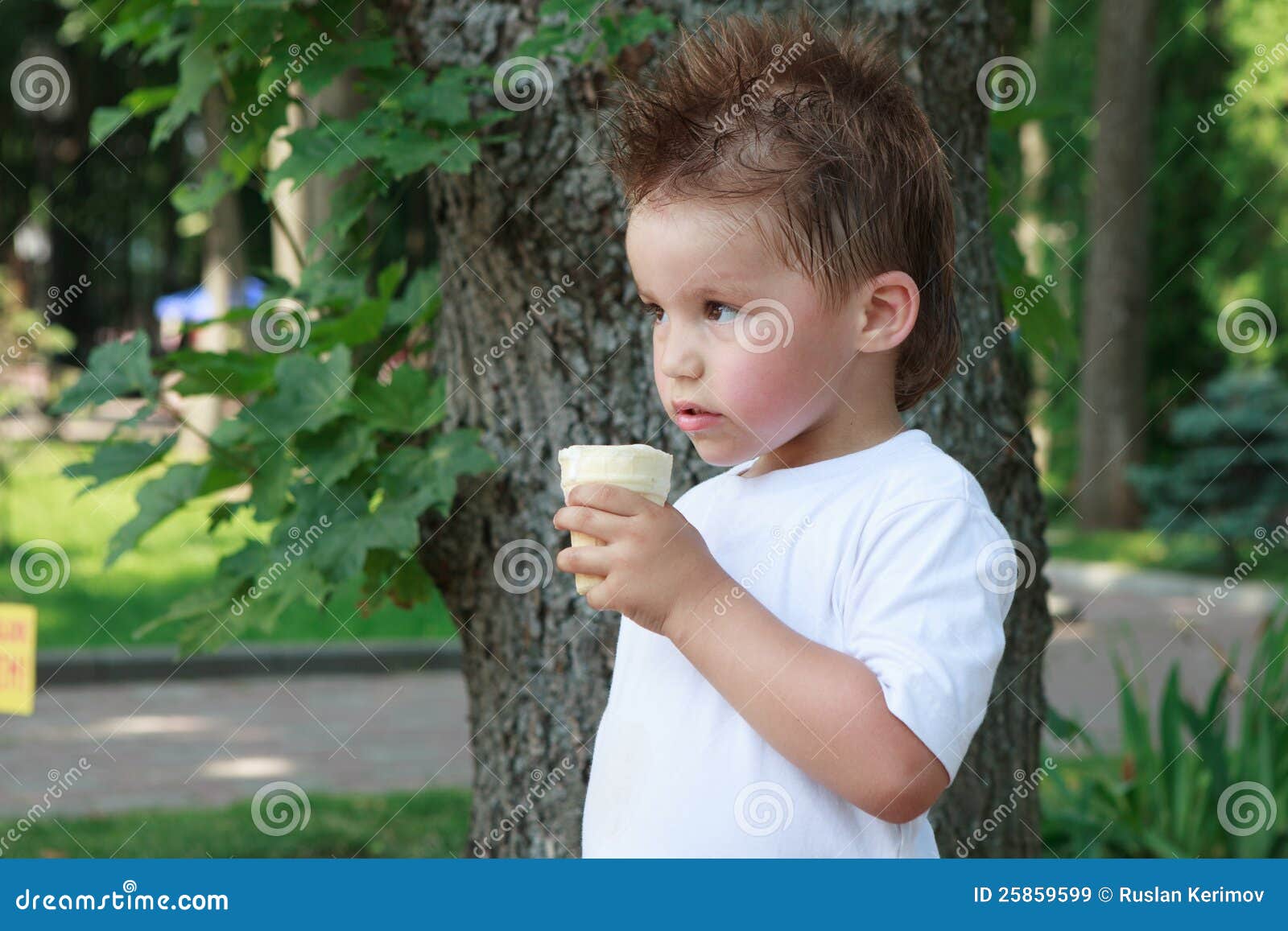 Little boy with icecream stock image. Image of child 25859599
