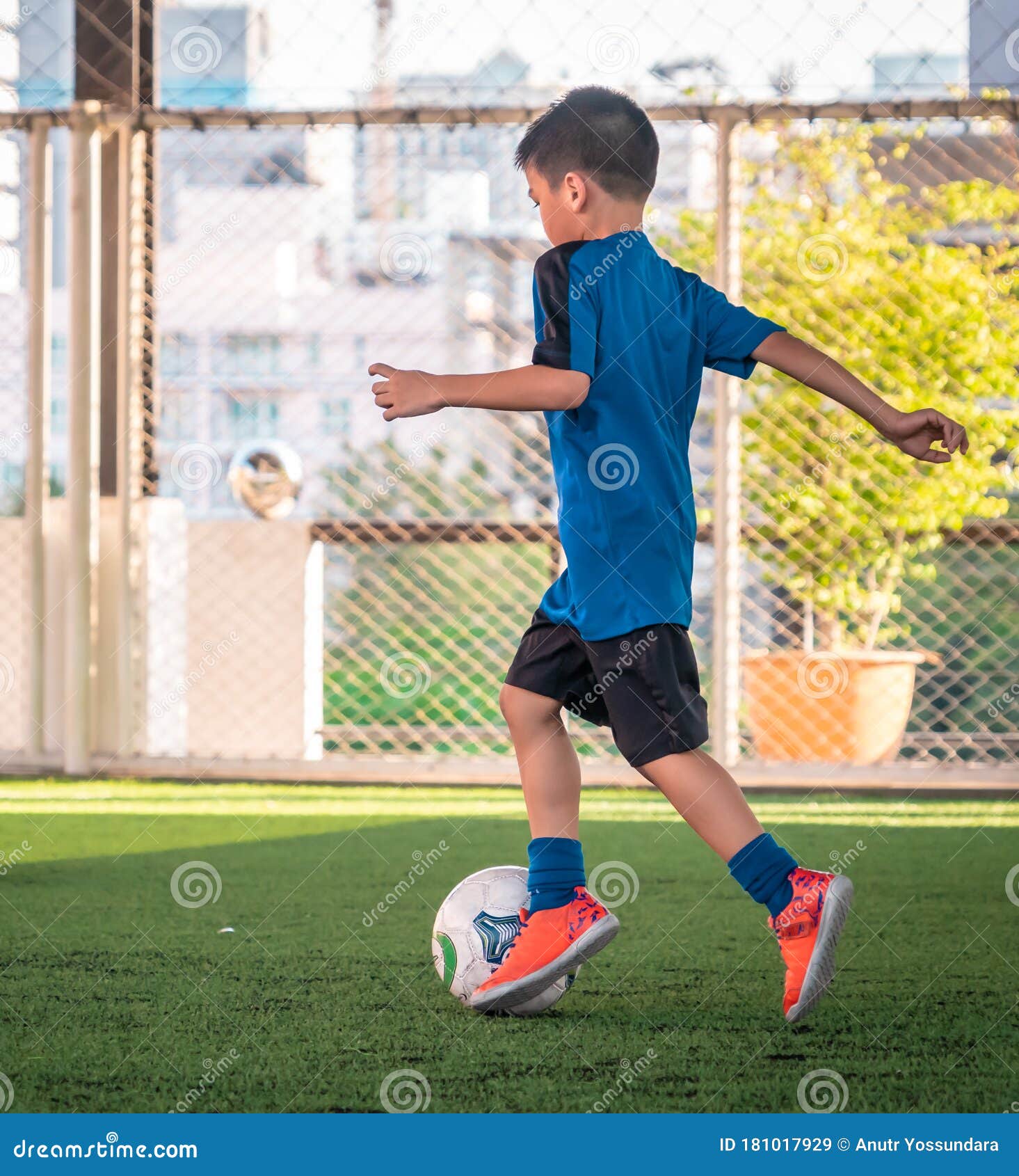 Football Or Soccer Shot With A Neutral Design Ball Being Kicked, With  Motion Blur On The Foot And Natural Background Stock Photo, Picture and  Royalty Free Image. Image 27280599.