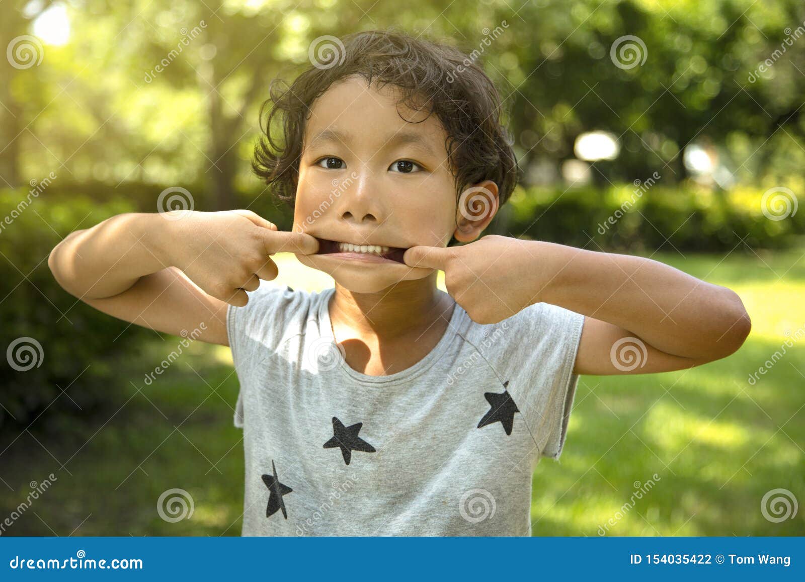 Little Boy Making a Funny Face Stock Photo Image of happy, outdoors