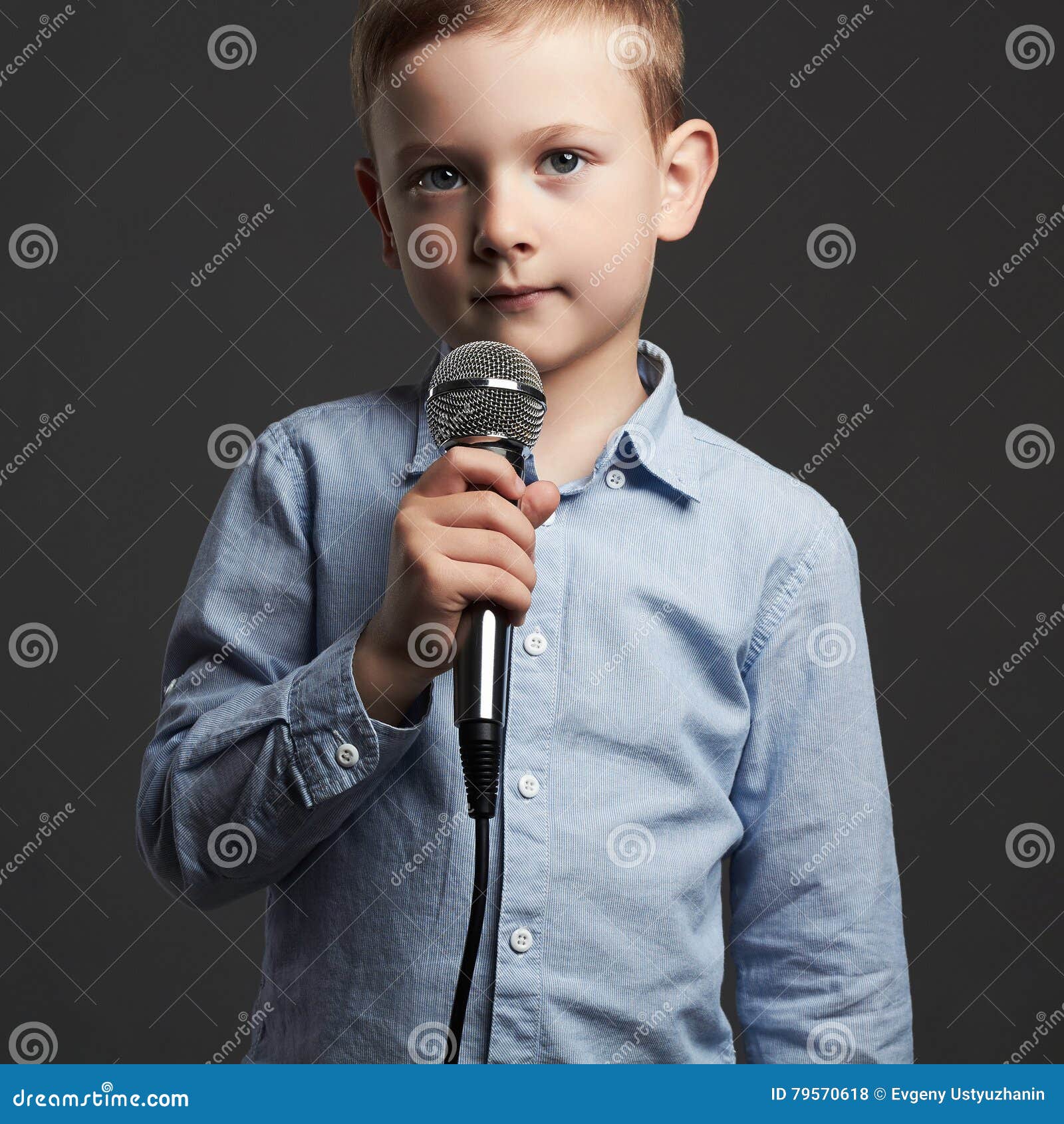 Little Boy with Microphone.child Singing in Karaoke Stock Photo Image