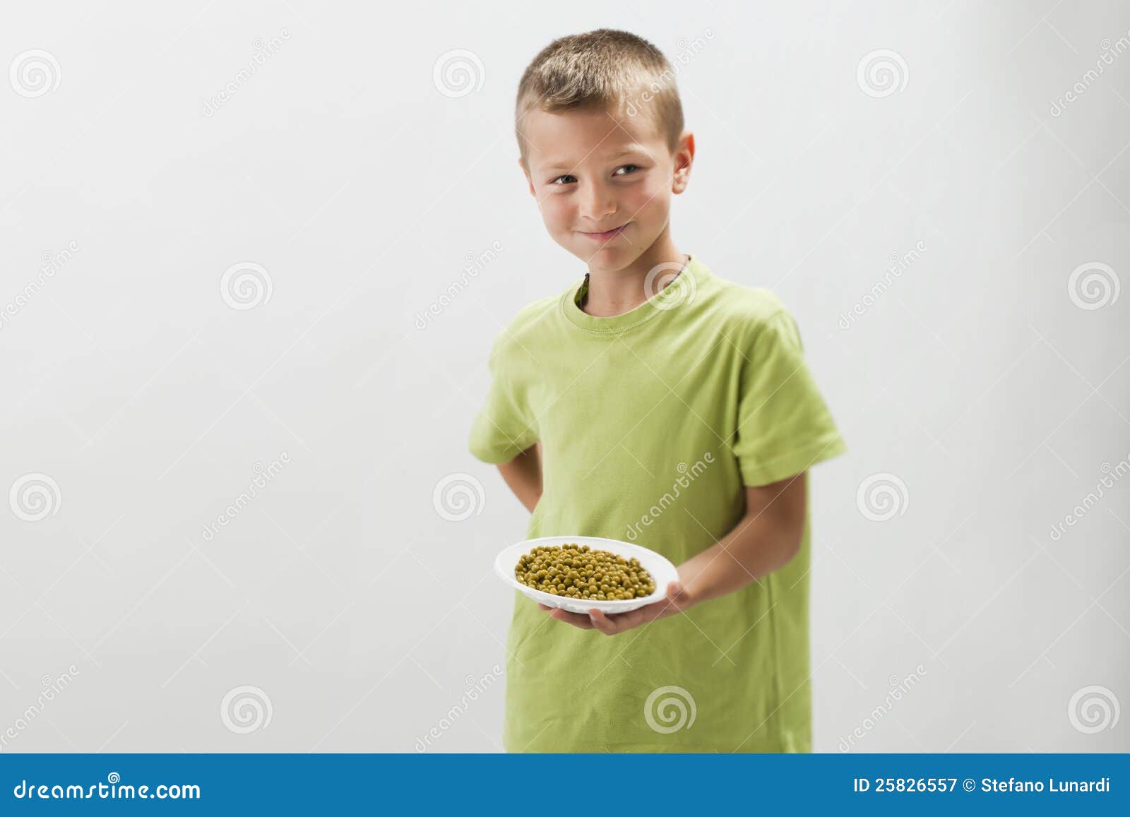 Little boy with peas stock image. Image of horizontal 25826557