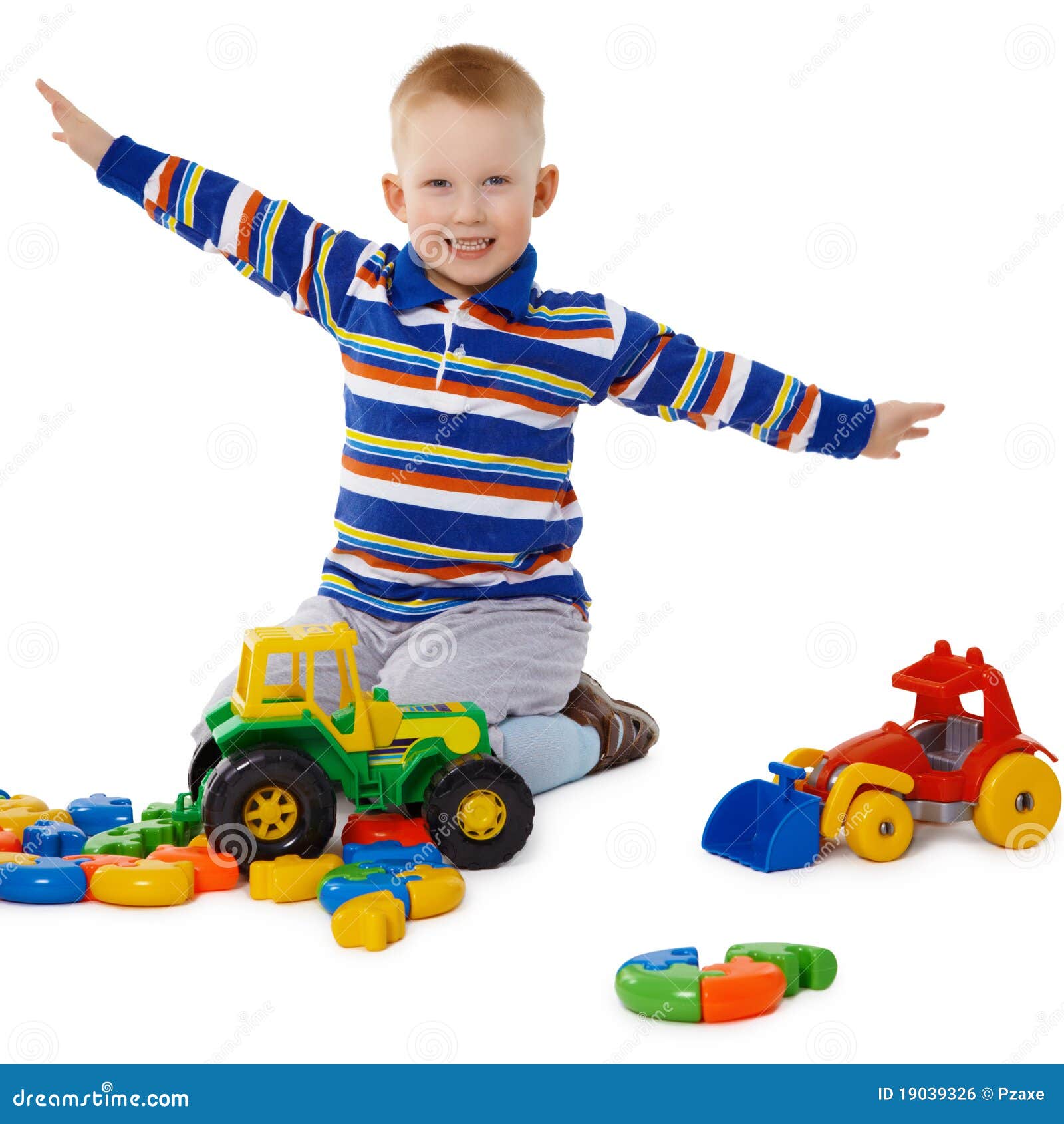 Little Boy Playing with Color Toys on Floor Stock Photo - Image of bulldozer, little: 19039326