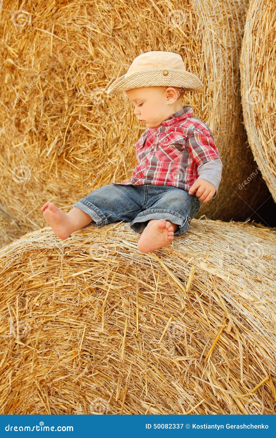 Little Boy Playing in a Cowboy Hat Stock Image Image of active