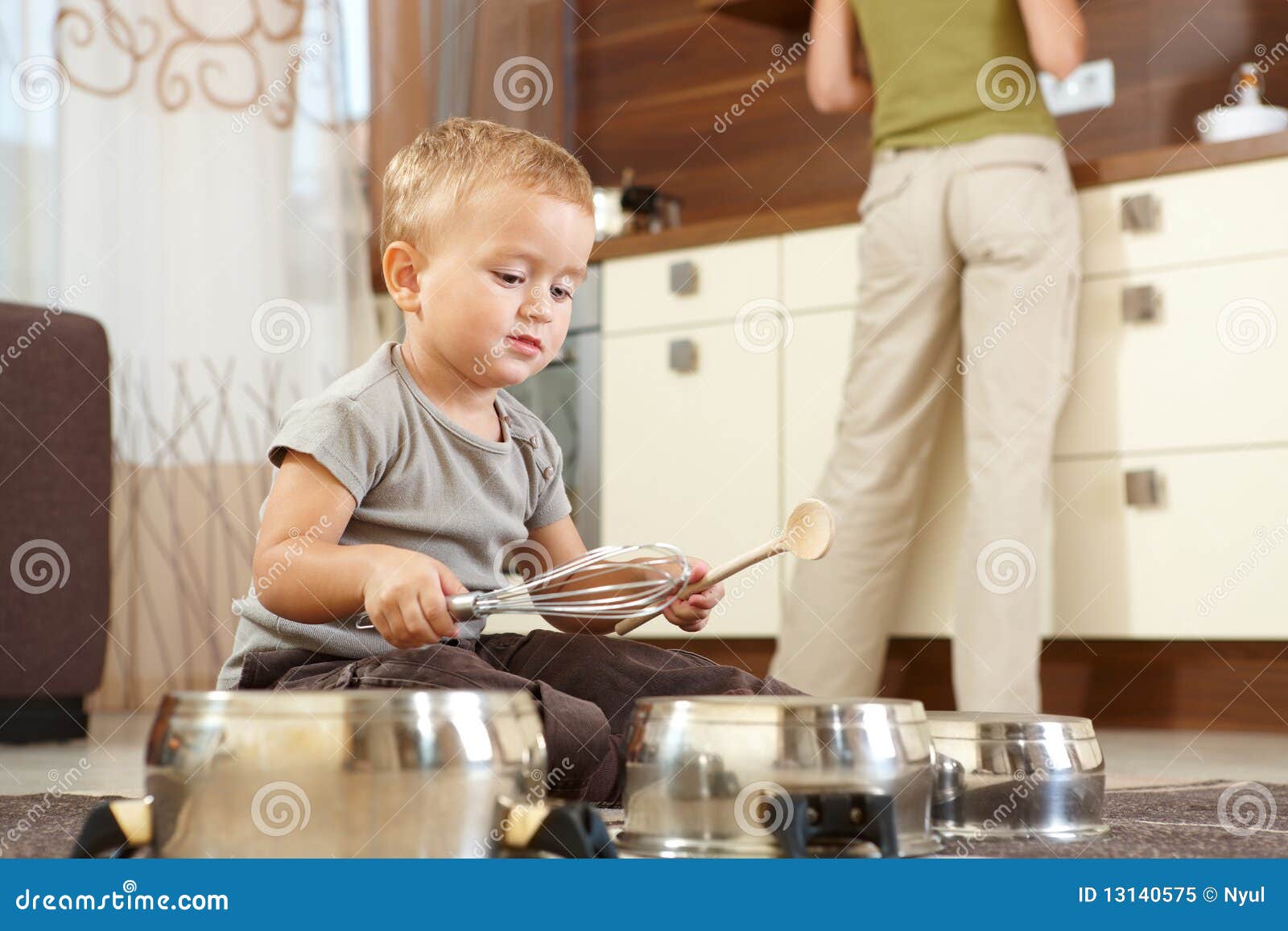 Little Boy Playing in Kitchen Stock Image Image of enjoyment