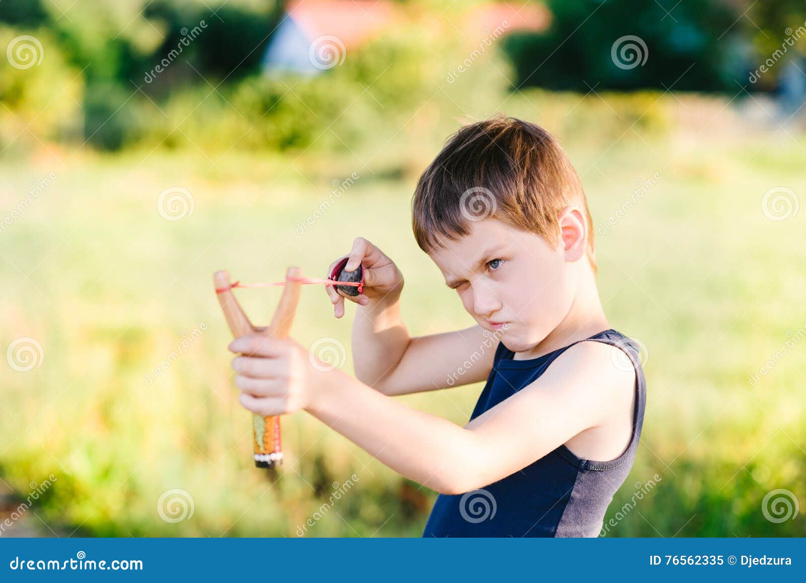Little Boy Playing with Slingshot Stock Image Image of concept