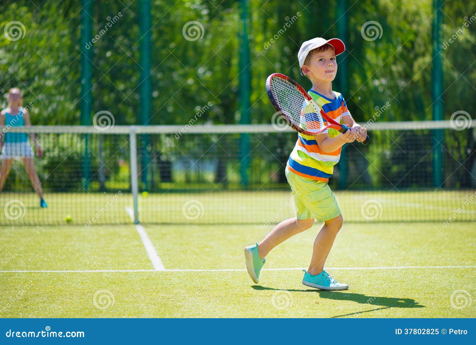 Little boy playing tennis stock image. Image of athletic 37802825