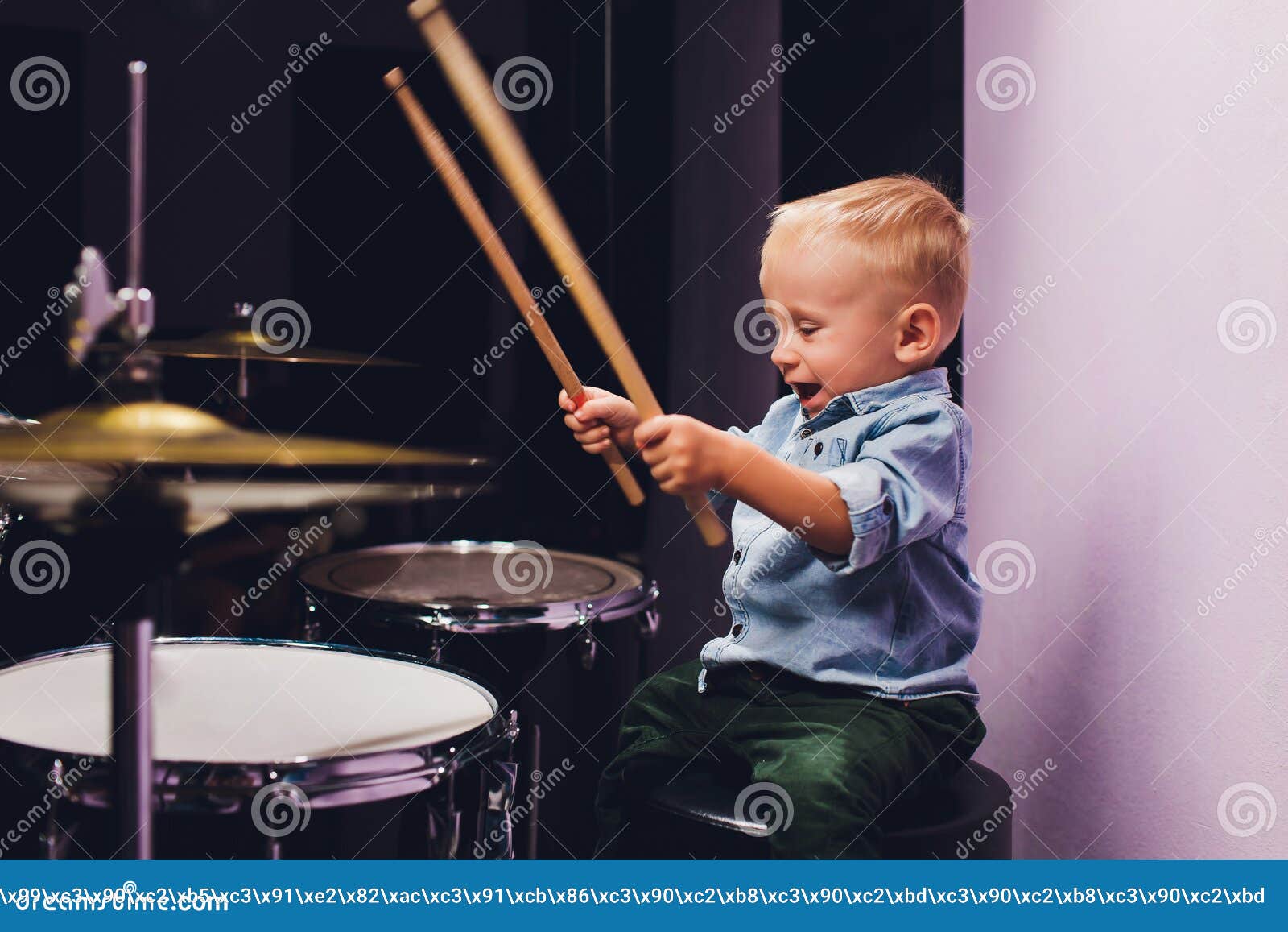 Little Boy Plays Drums in Recording Studio. Stock Image Image of