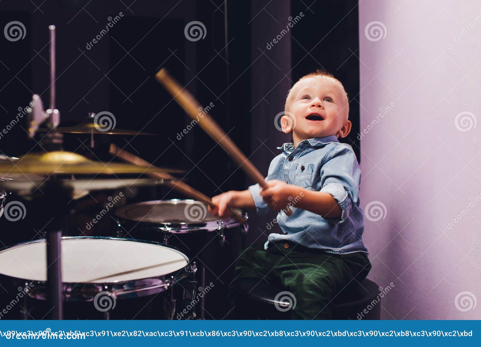 Little Boy Plays Drums in Recording Studio. Stock Image Image of