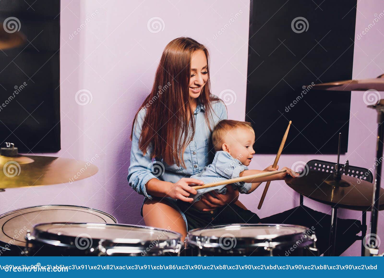 Little Boy Plays Drums in Recording Studio. Stock Photo Image of
