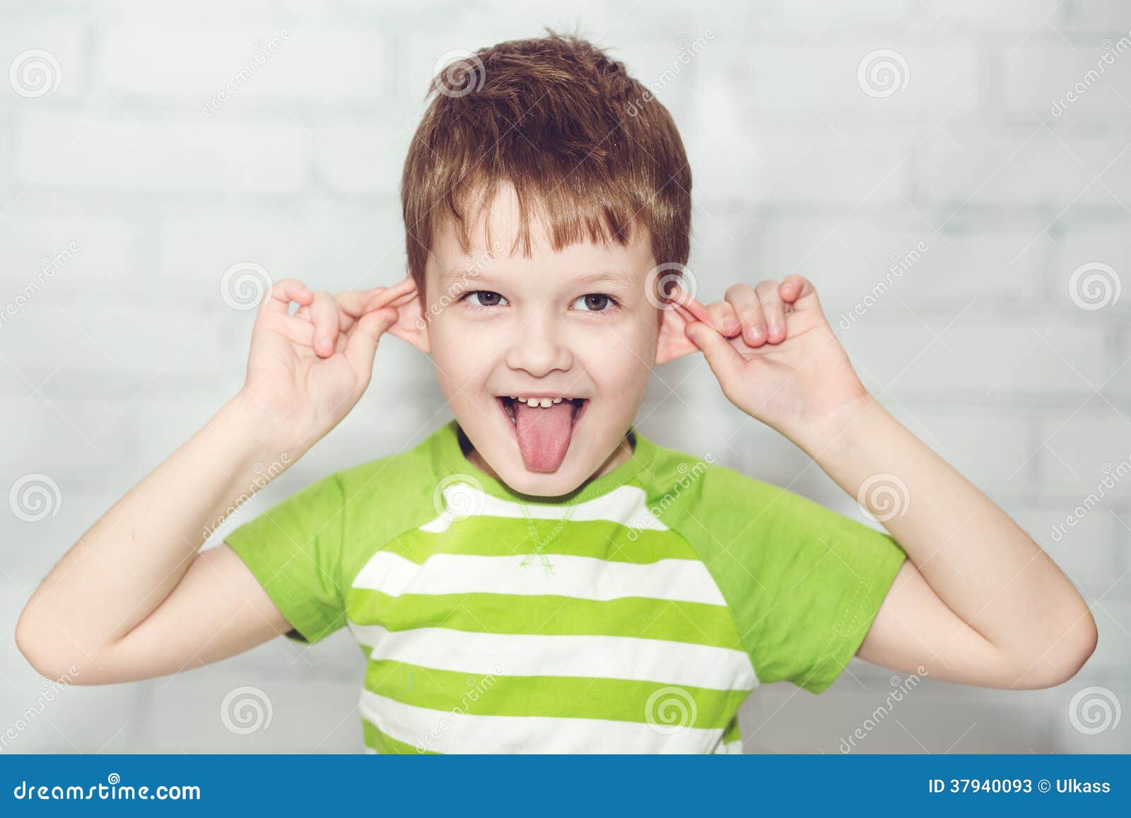 Little Boy, Pulling Himself On The Ears Stock Image Image 37940093