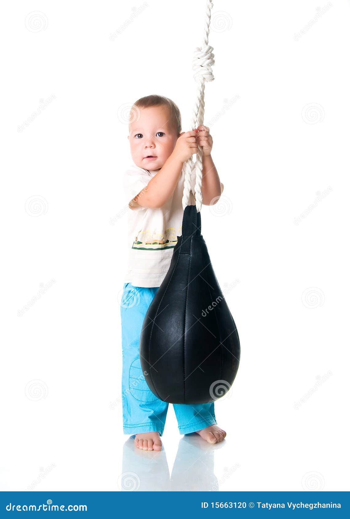 Little Boy with the Punching Bag Stock Photo Image of power