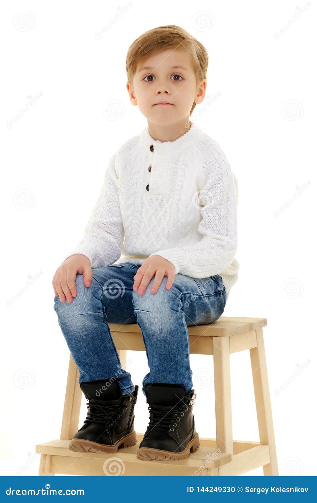 A Little Boy is Sitting on a Chair. Stock Photo - Image of seat, little ...