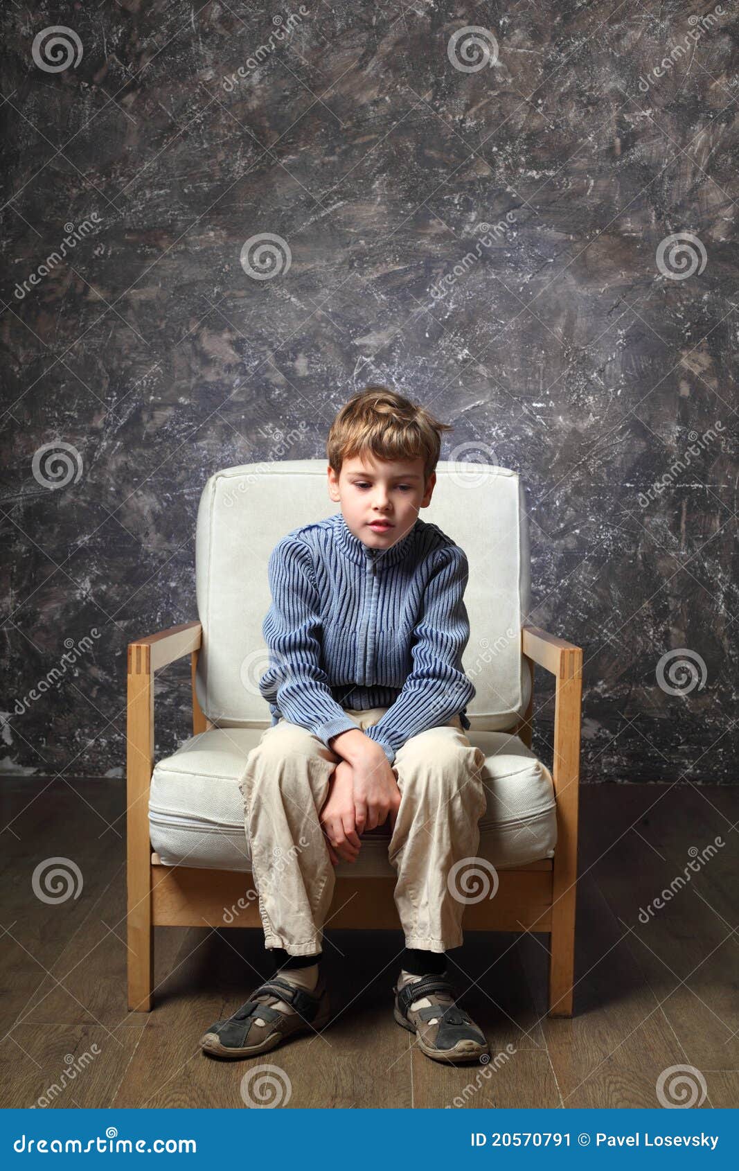 Little Boy Sitting on Chair in Studio Stock Image - Image of chair