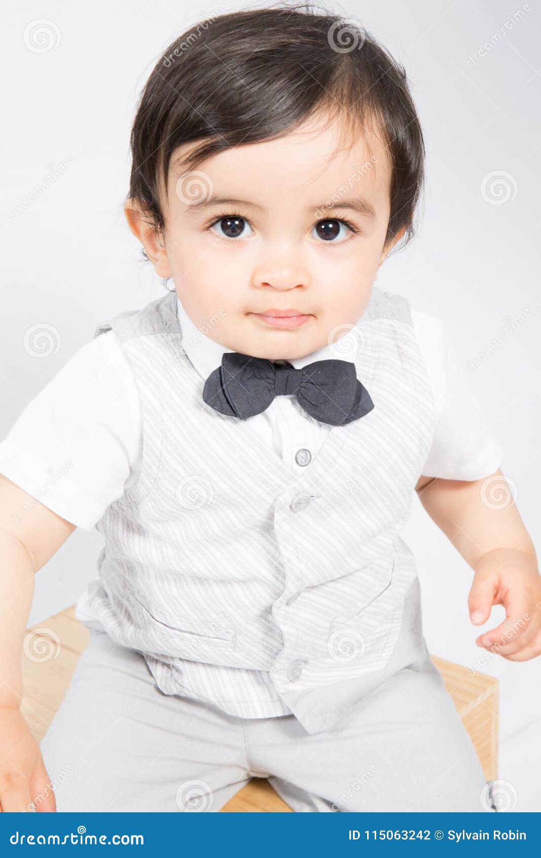 Little Boy Smiling in a White Shirt Happy Child with Bow Tie Stock ...