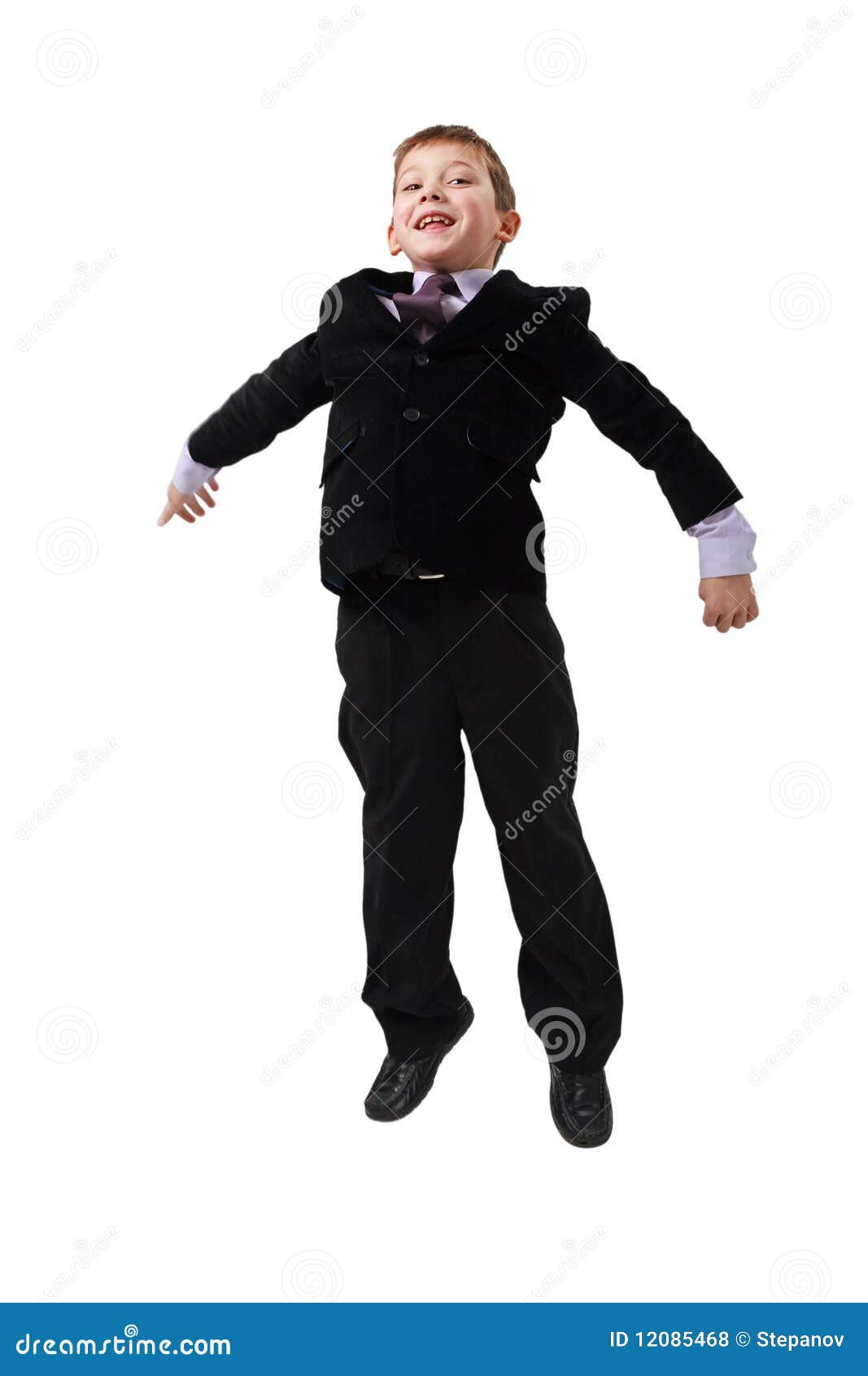 Little boy in suit jumping stock photo. Image of isolated 12085468