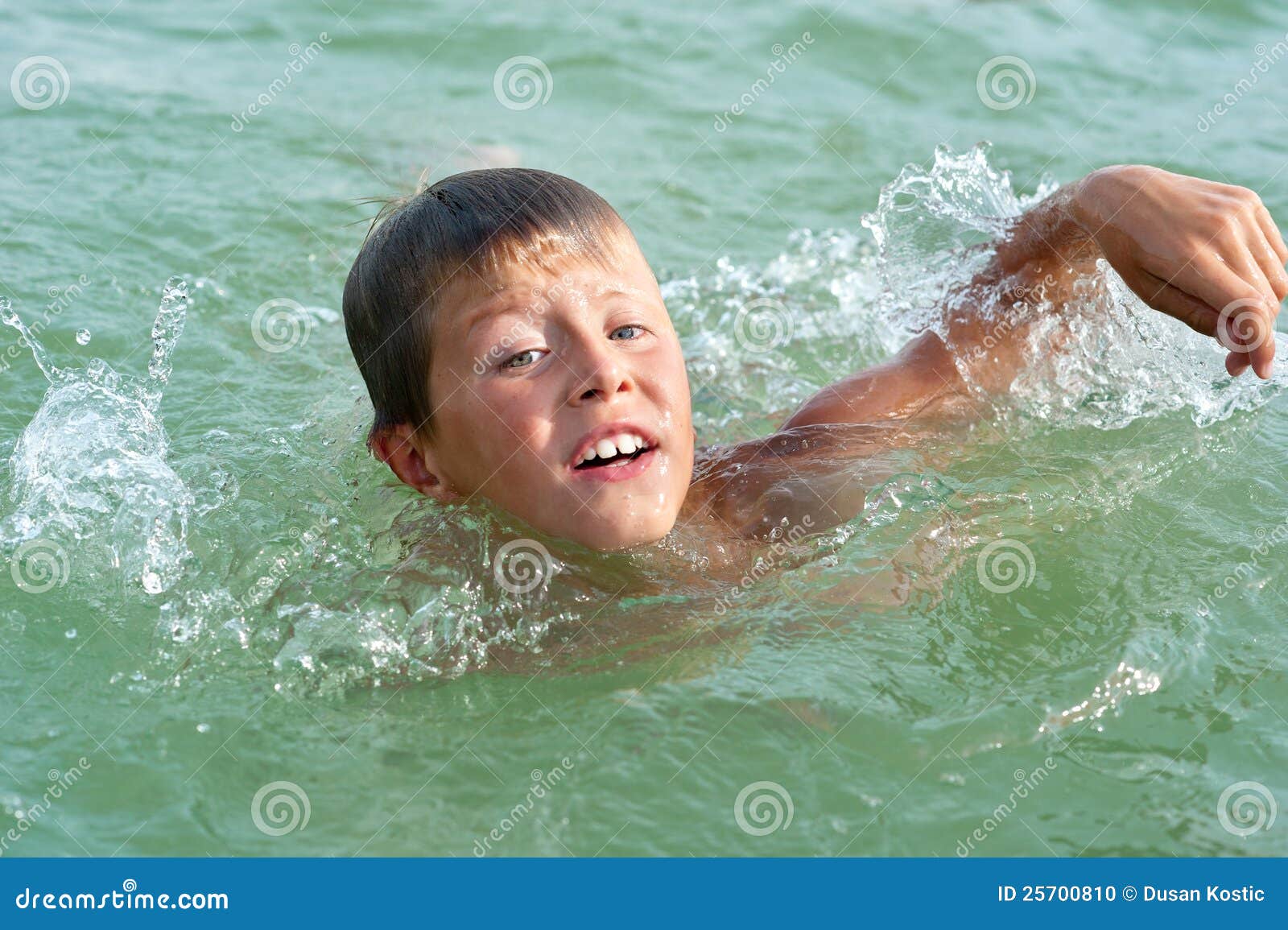 Little boy swimming stock photo. Image of effort, little 25700810