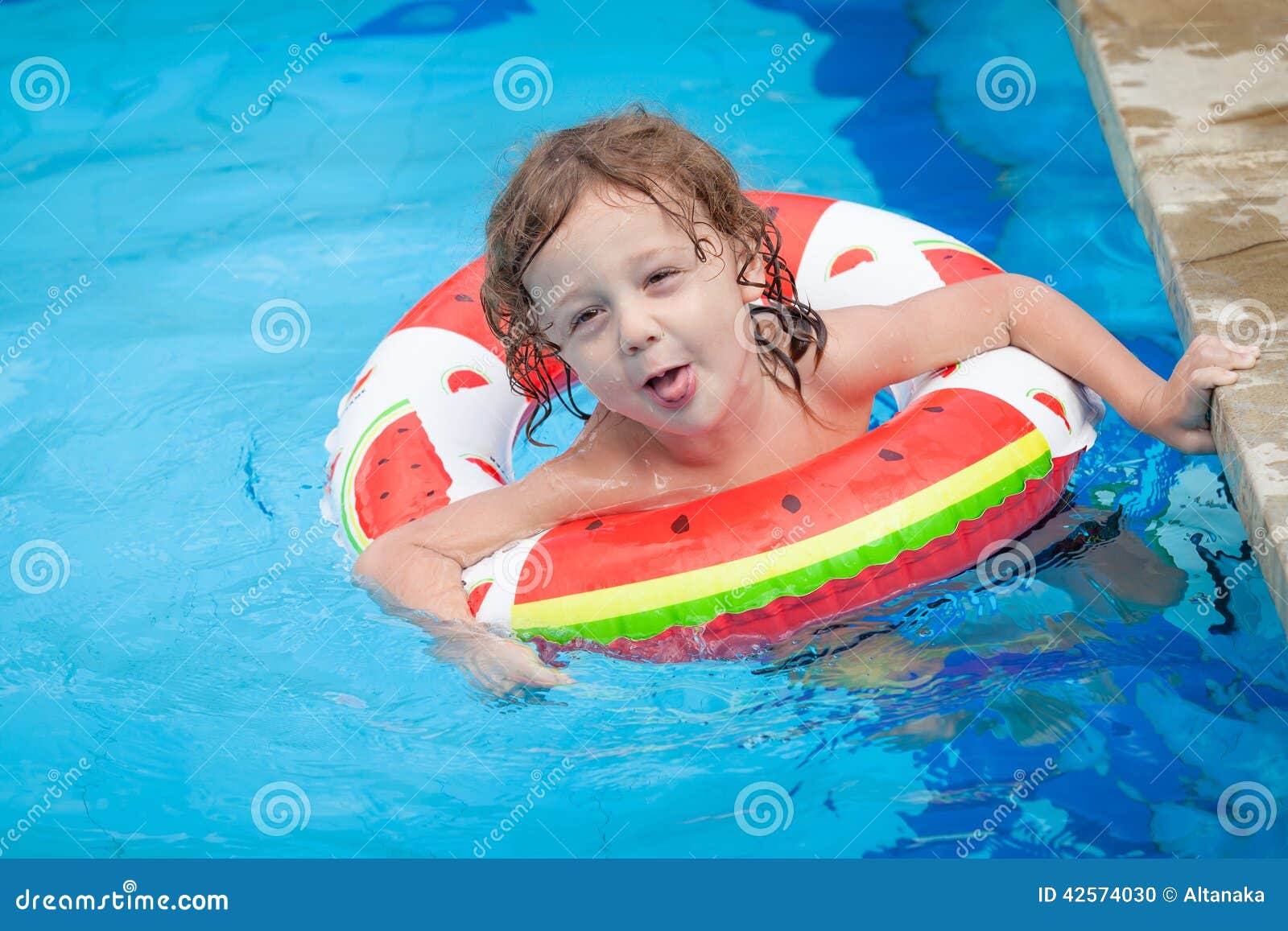 Little Boy in the Swimming Pool with Rubber Ring Stock Photo - Image of ...