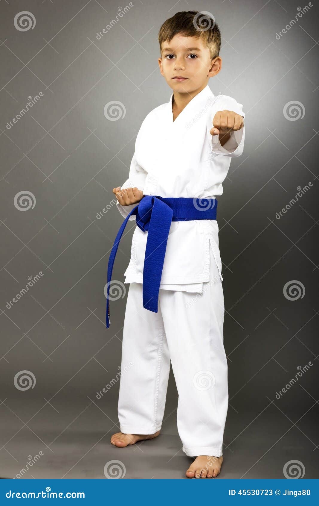 Little boy training karate stock image. Image of length 45530723