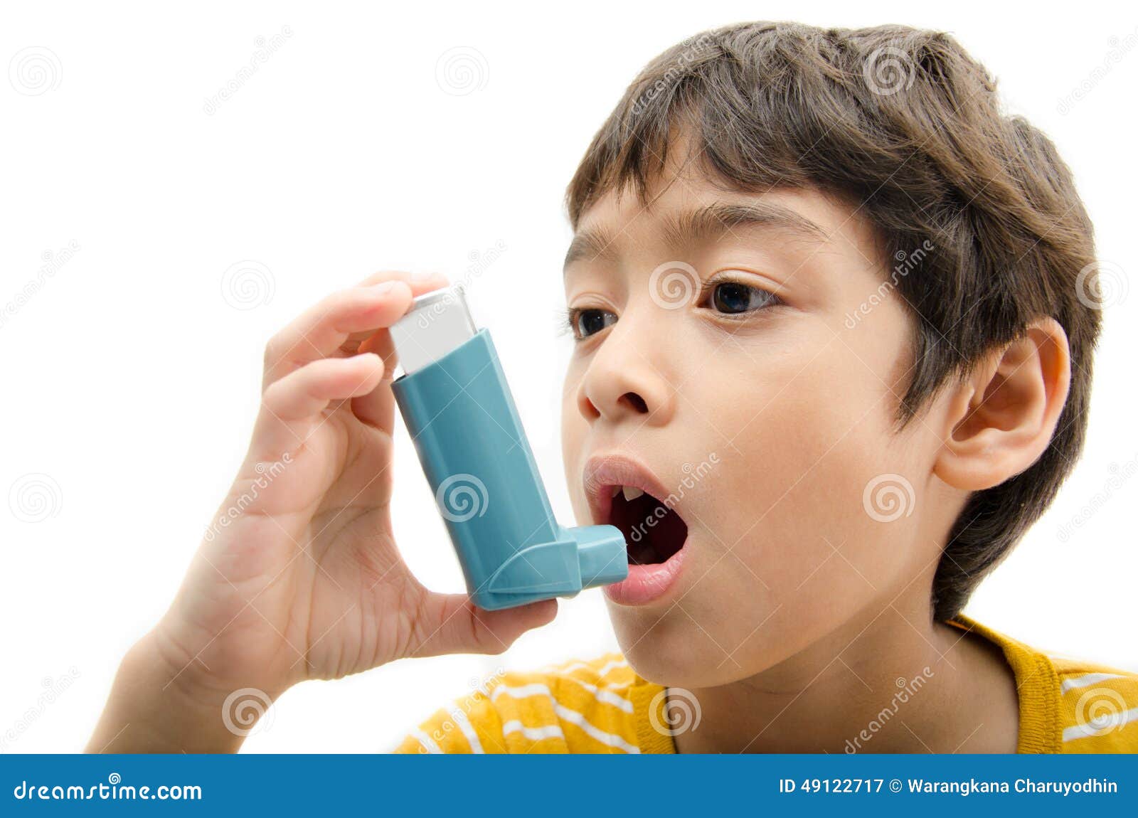 little boy using asthma inhaler for breathing