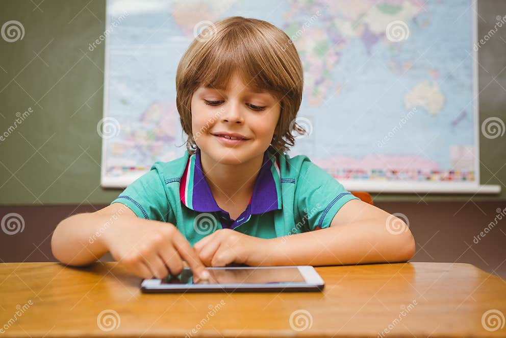 Little Boy Using Digital Tablet in Classroom Stock Photo Image of