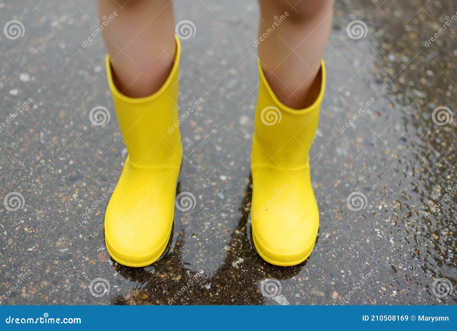 174 Boy Gumboots Little Yellow Stock Photos - Free & Royalty-Free Stock  Photos from Dreamstime