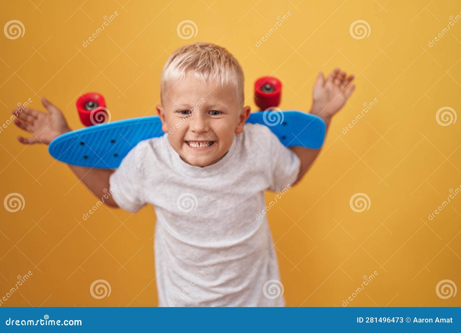 Little Caucasian Boy Holding Skate Clueless and Confused Expression