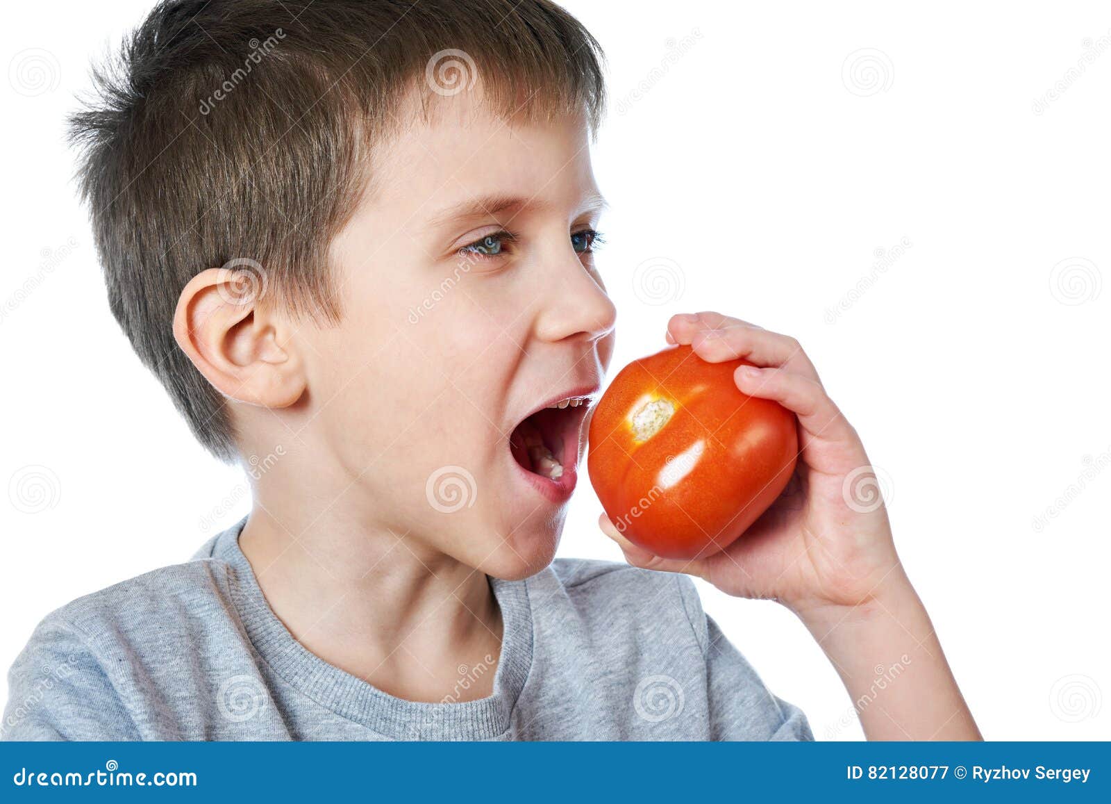 Little Cheerful Boy Eating Tomato Isolated Stock Image Image of