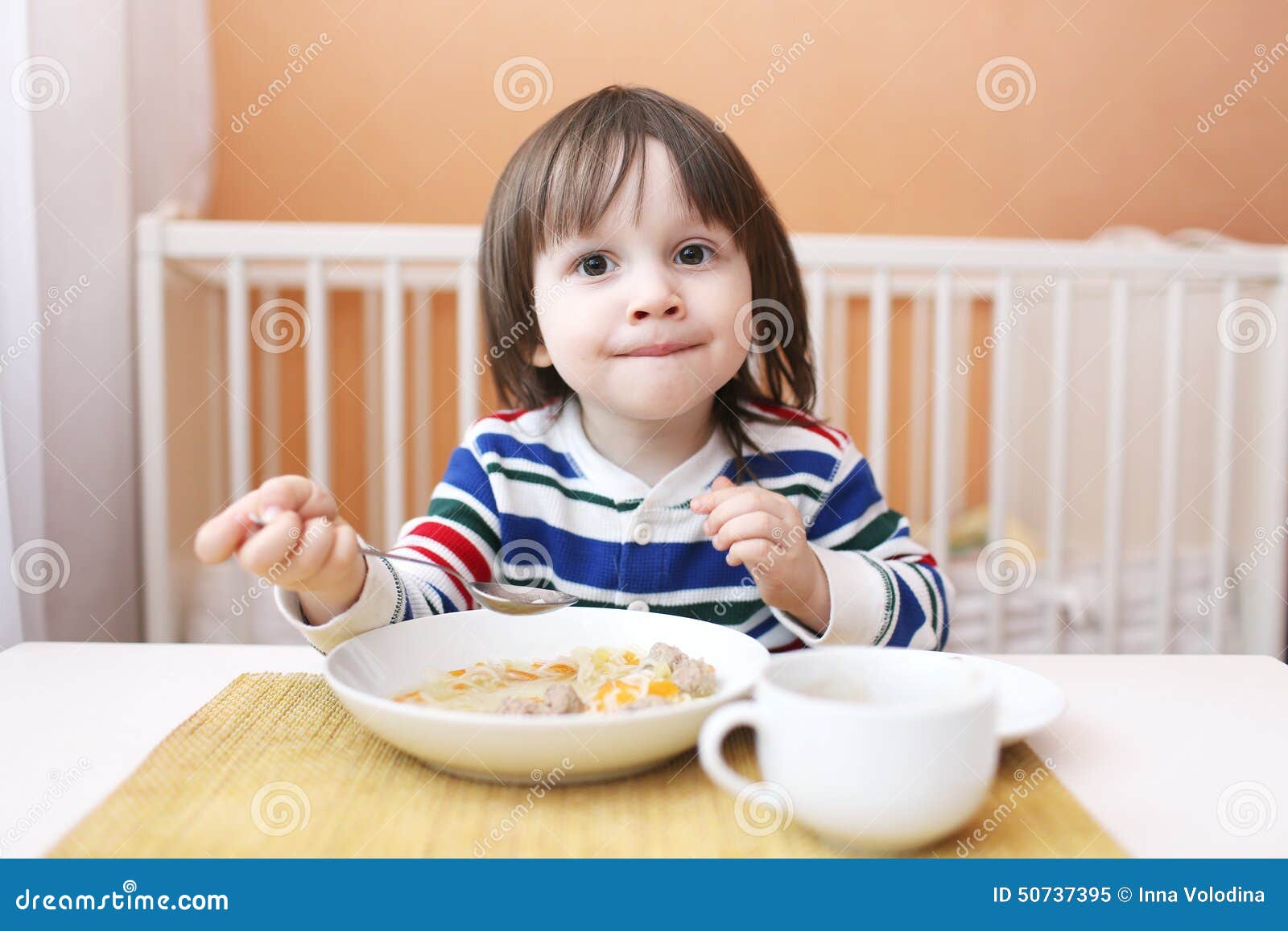Little child eats soup stock image. Image of caucasian 50737395