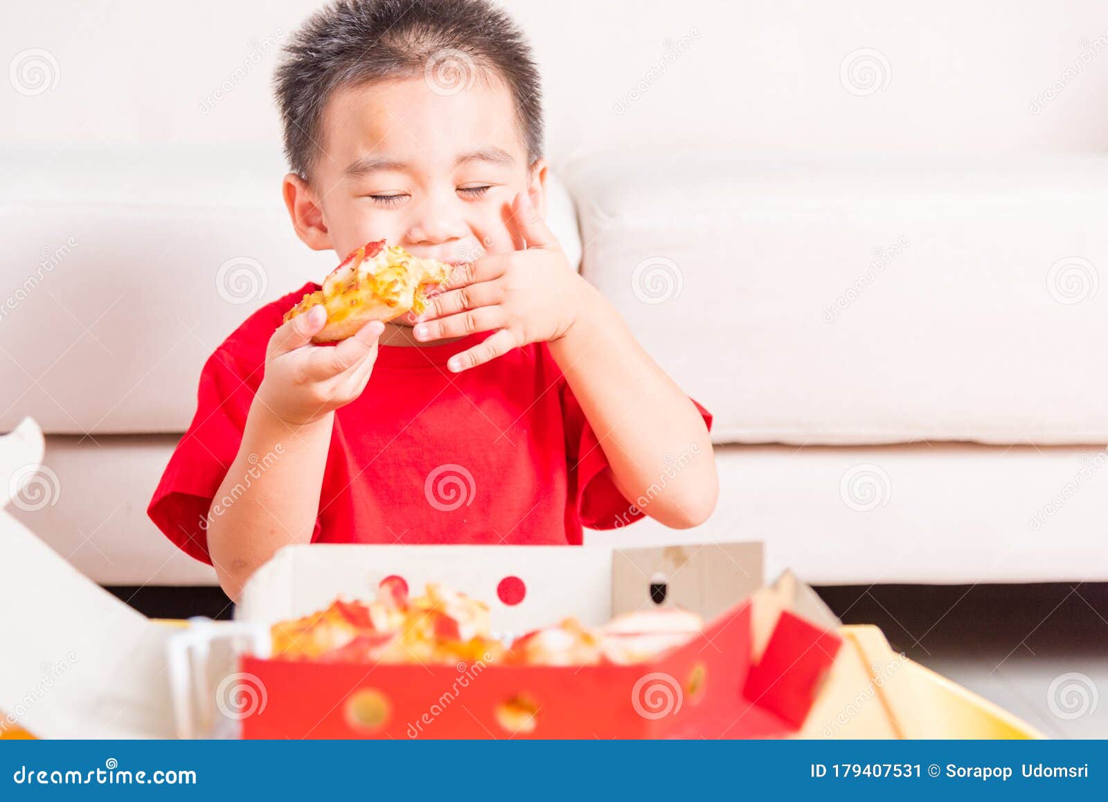 Little Child Enjoying Eating Delivery Stock Image - Image of enjoy