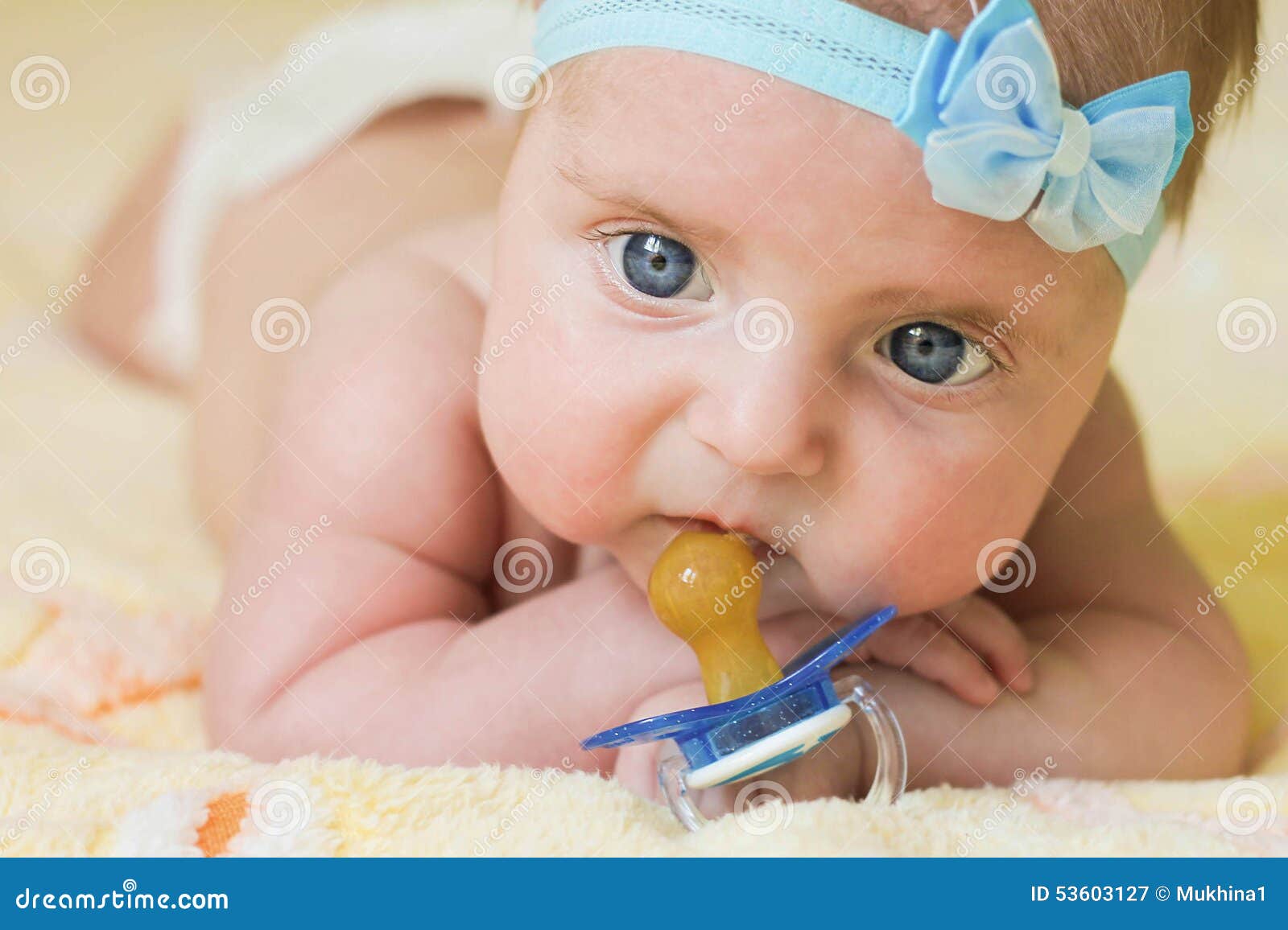A Little Child Holds a Pacifier in His Hand Stock Image Image of nice