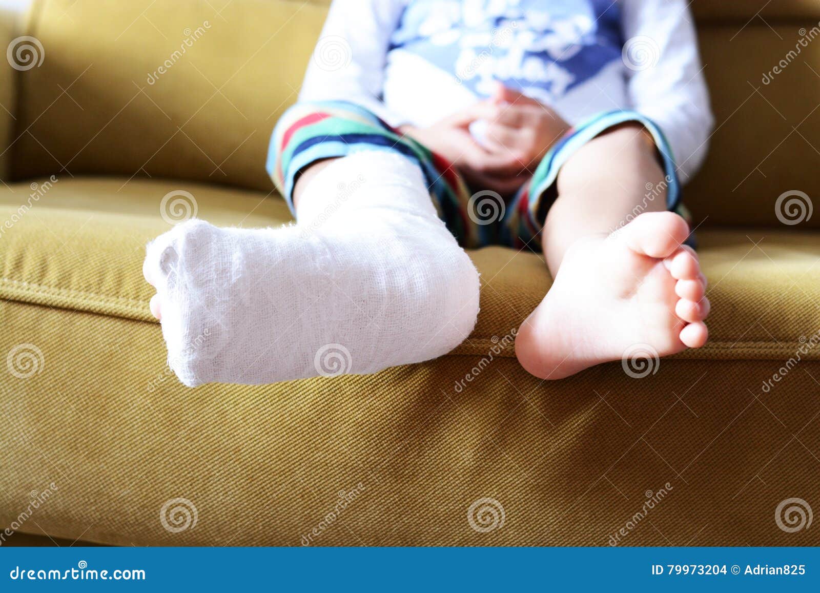 little child with plaster bandage on leg heel fractured