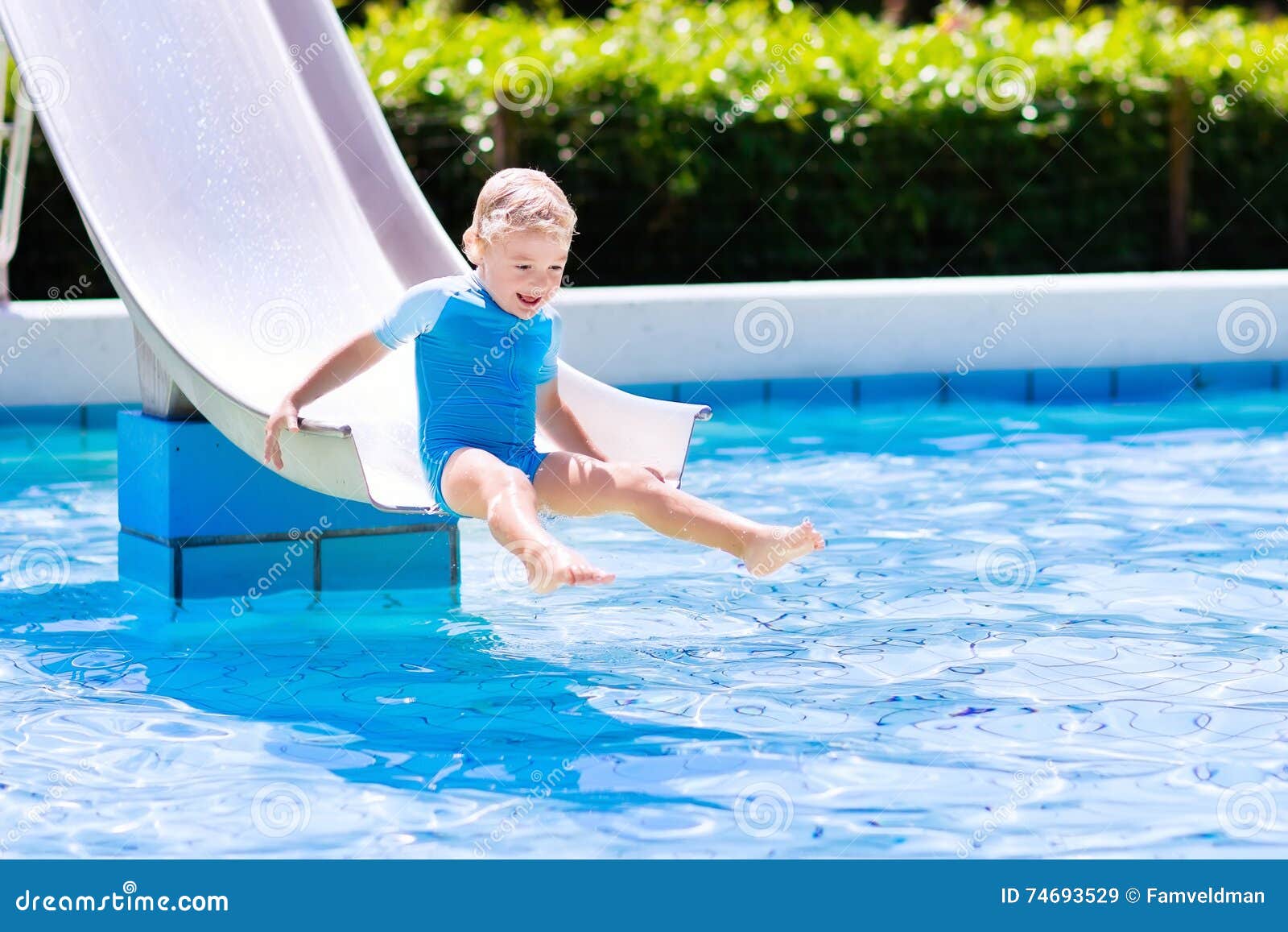 Download Little Child On Water Slide In Swimming Pool Stock Image - Image of playing, exotic: 74693529
