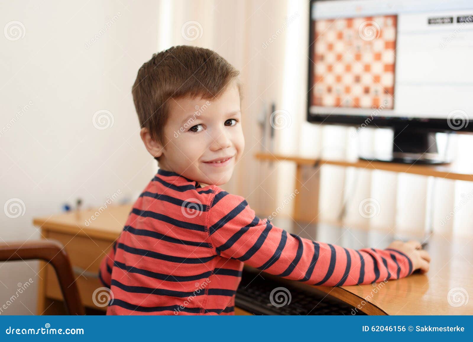 Little Clever Boy Playing Chess Online Stock Photo - Image of monitor,  home: 62046156