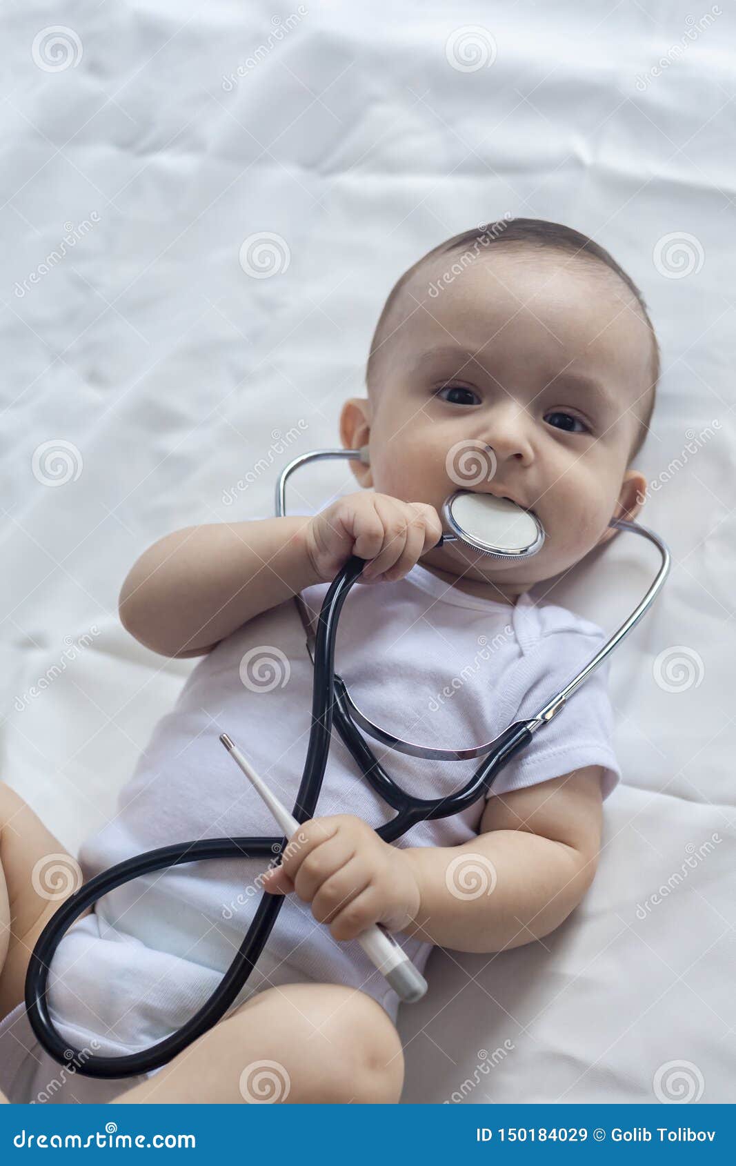 Little Cute Baby Doctor. 6-month Old Baby Boy Playing with ...