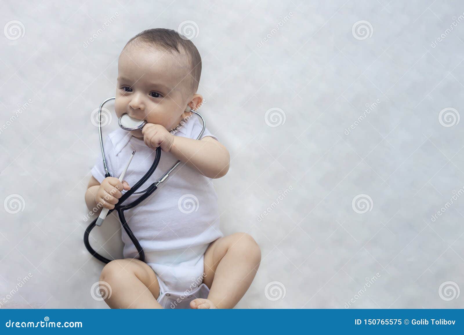 Little Cute Baby Doctor. 6-month Old Baby Boy Playing with ...