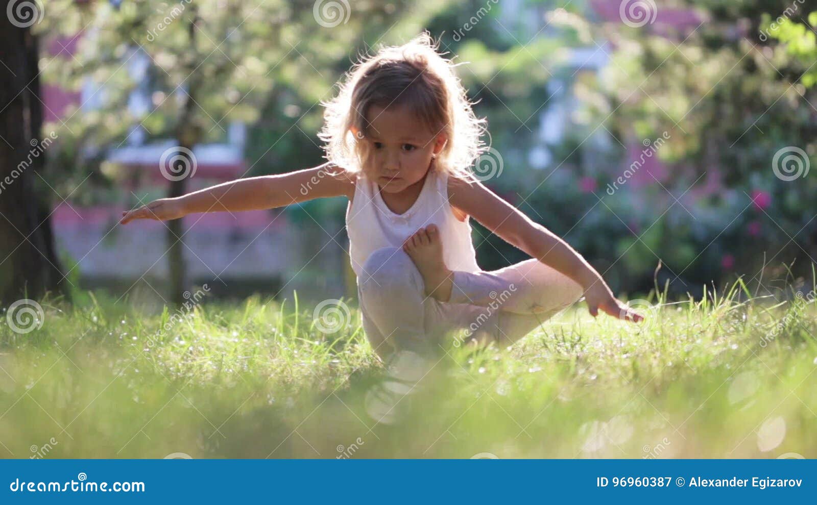 Little Cute Baby Girl Doing Yoga Exercise on the Grass in Park. Stock Video  - Video of baby, field: 96960387