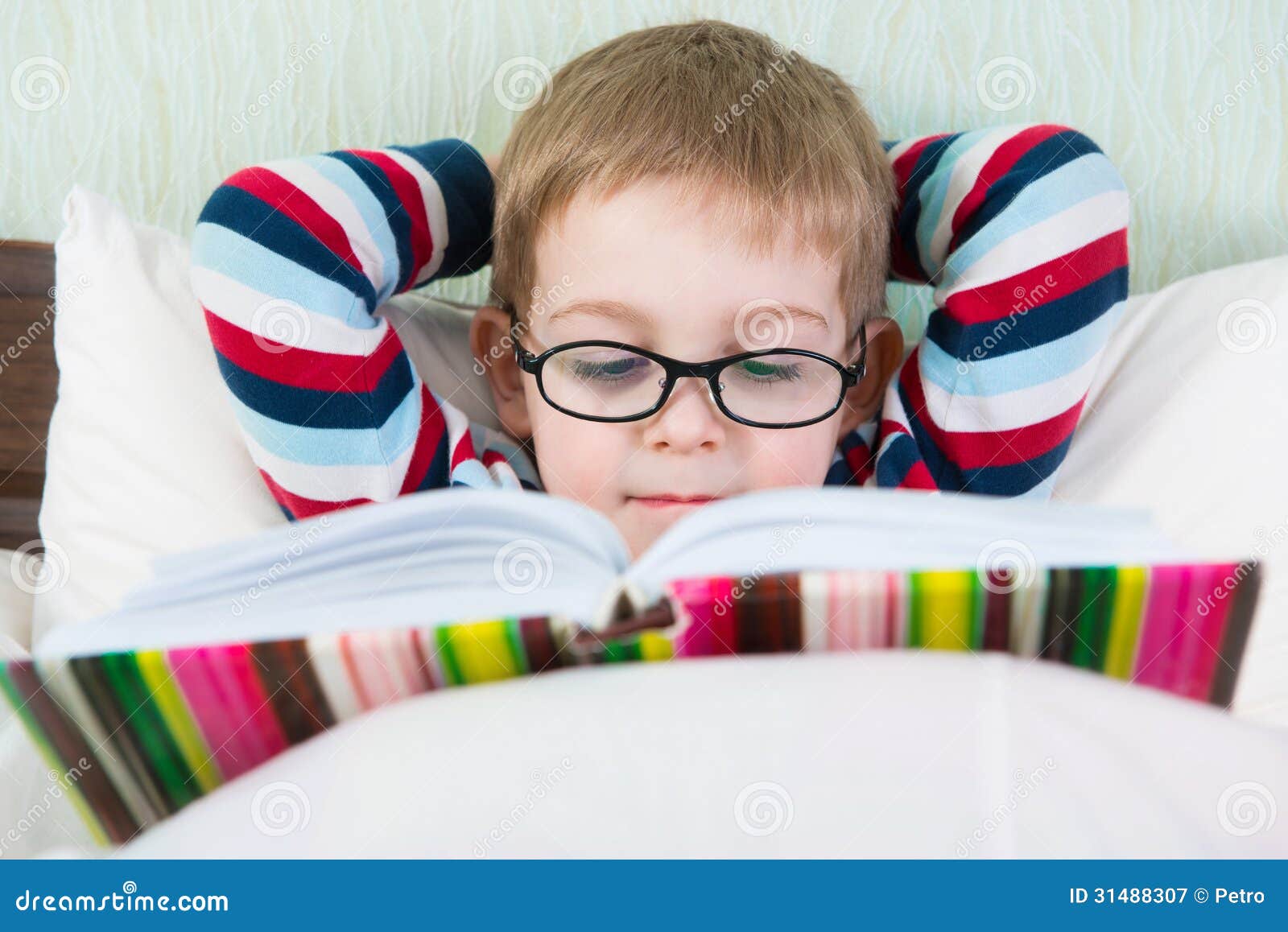 Little Cute Boy Reading Book in Bed Stock Image Image of childhood
