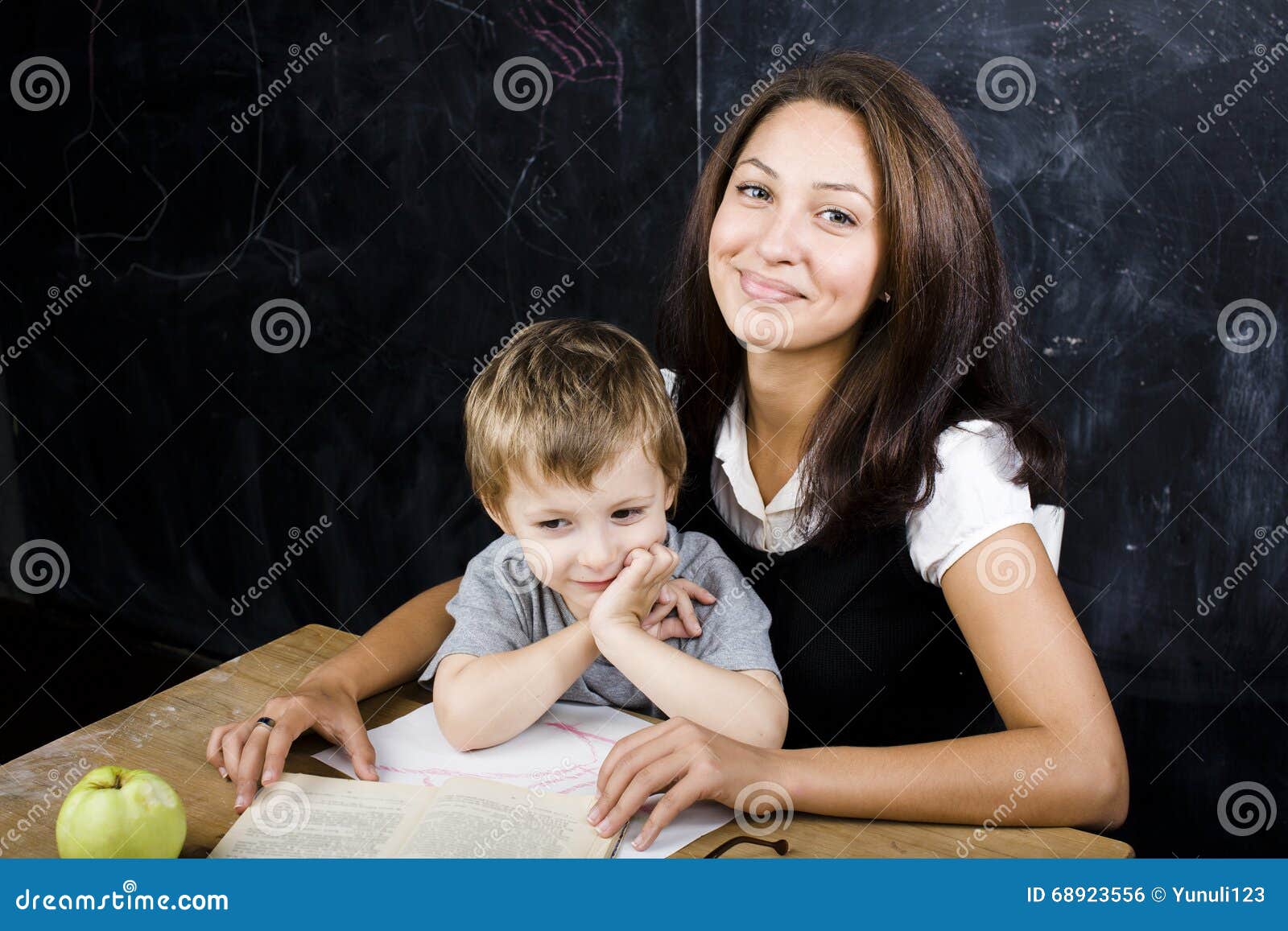 Image result for images of a  teacher holding a hand of a small boy