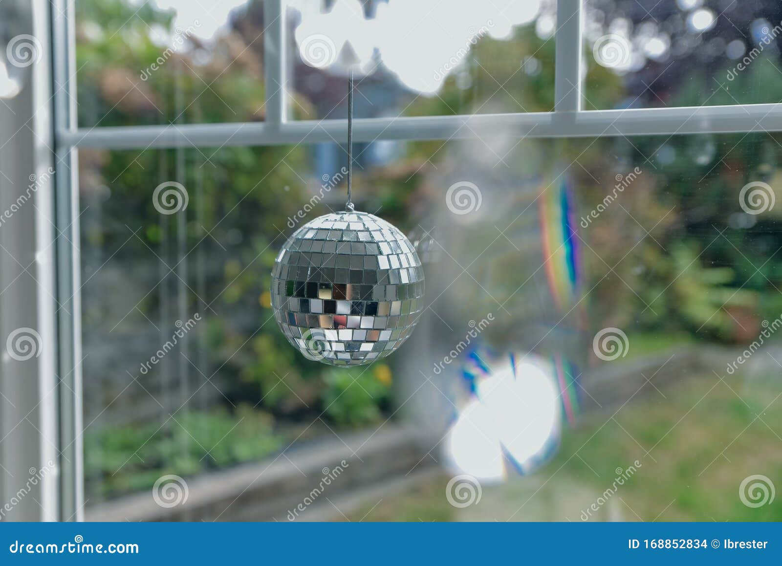Little Disco Ball Sees by the Window Stock Photo Image of window