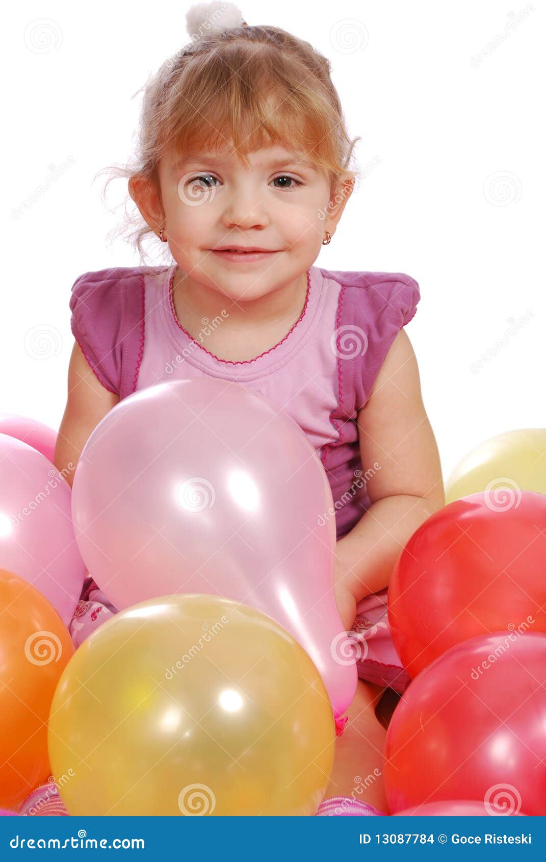Little girl with balloons stock photo. Image of party 13087784