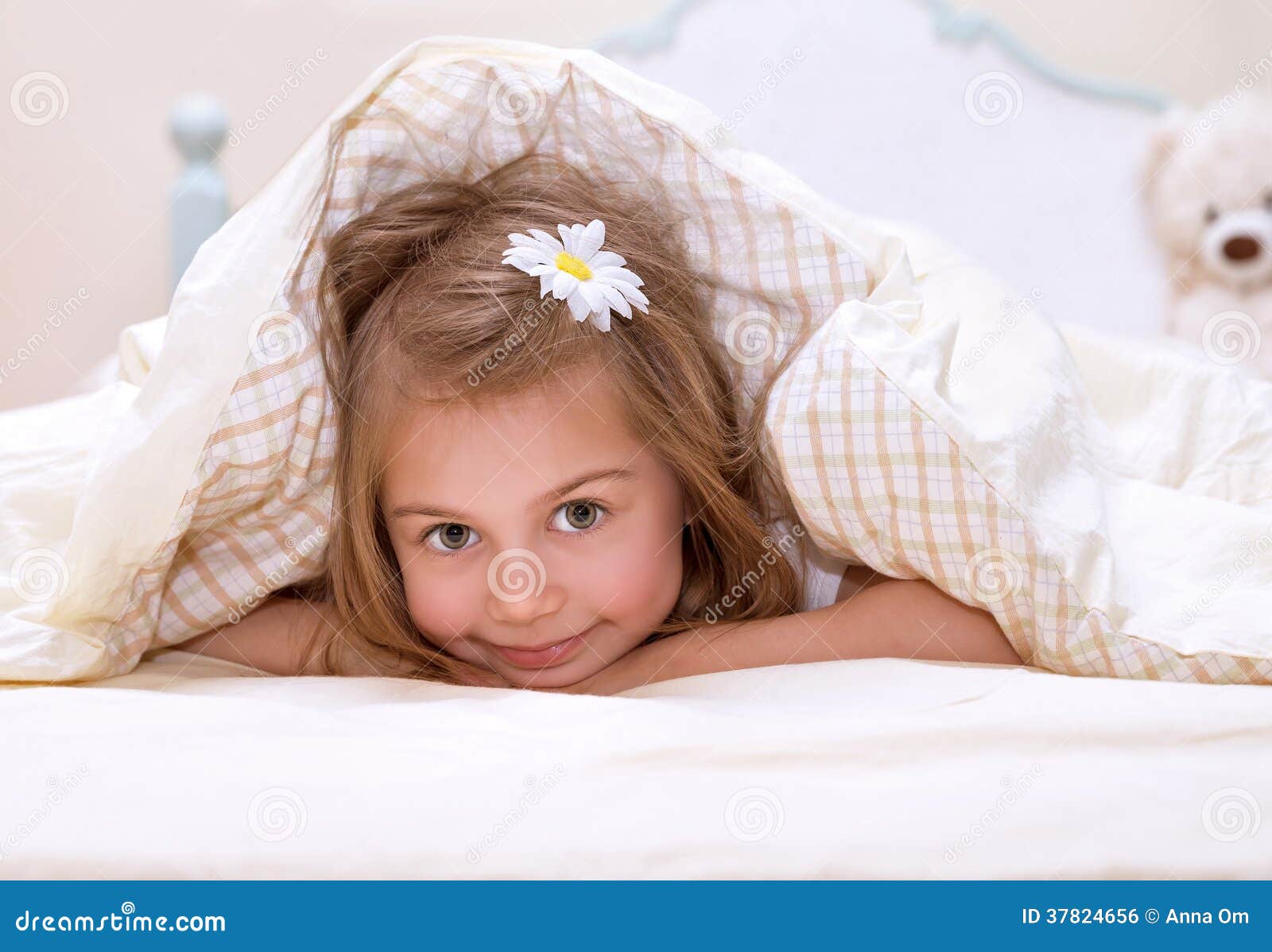 Little girl in the bed stock photo. Image of lifestyle 37824656