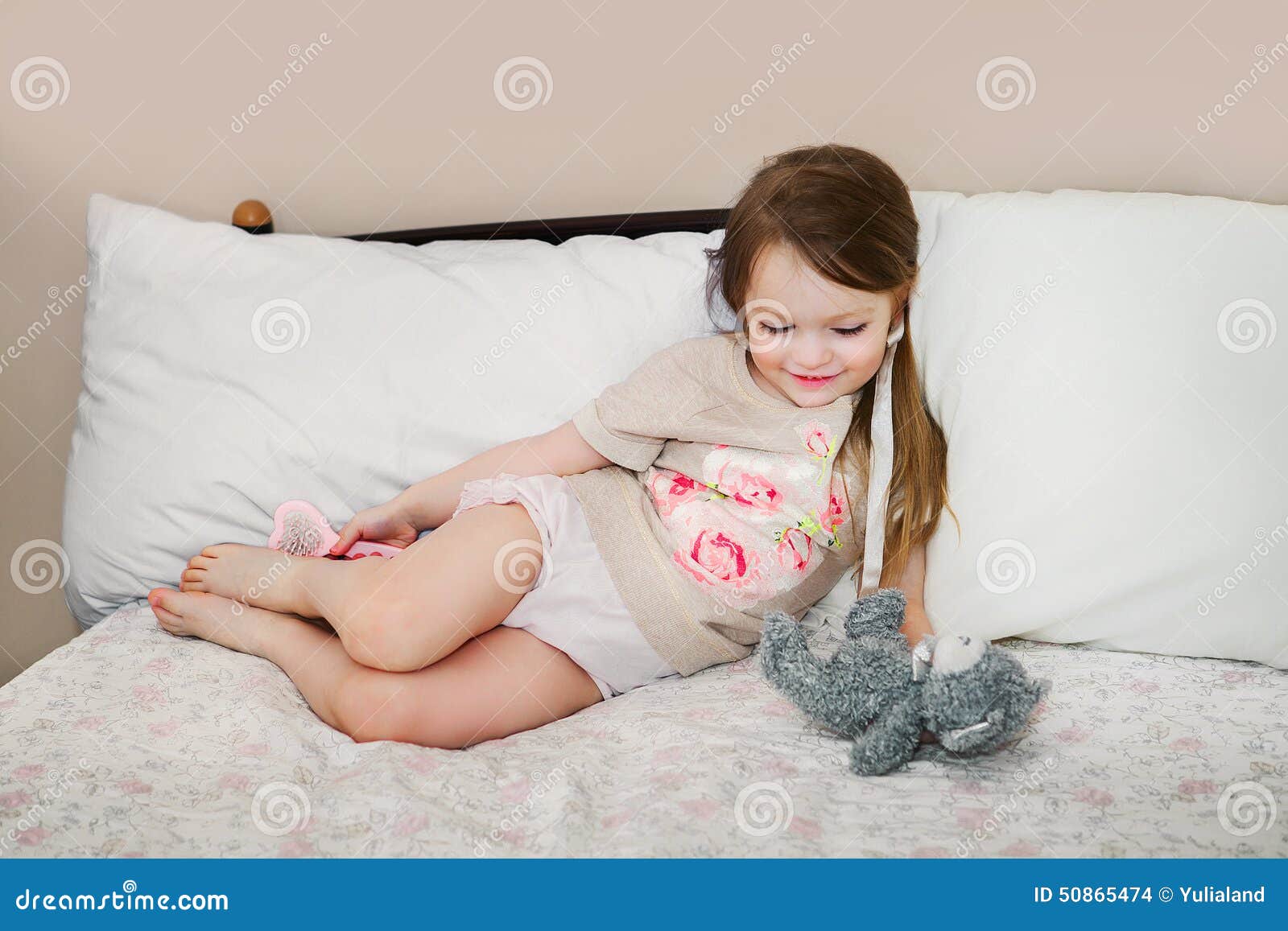 little girl on bed