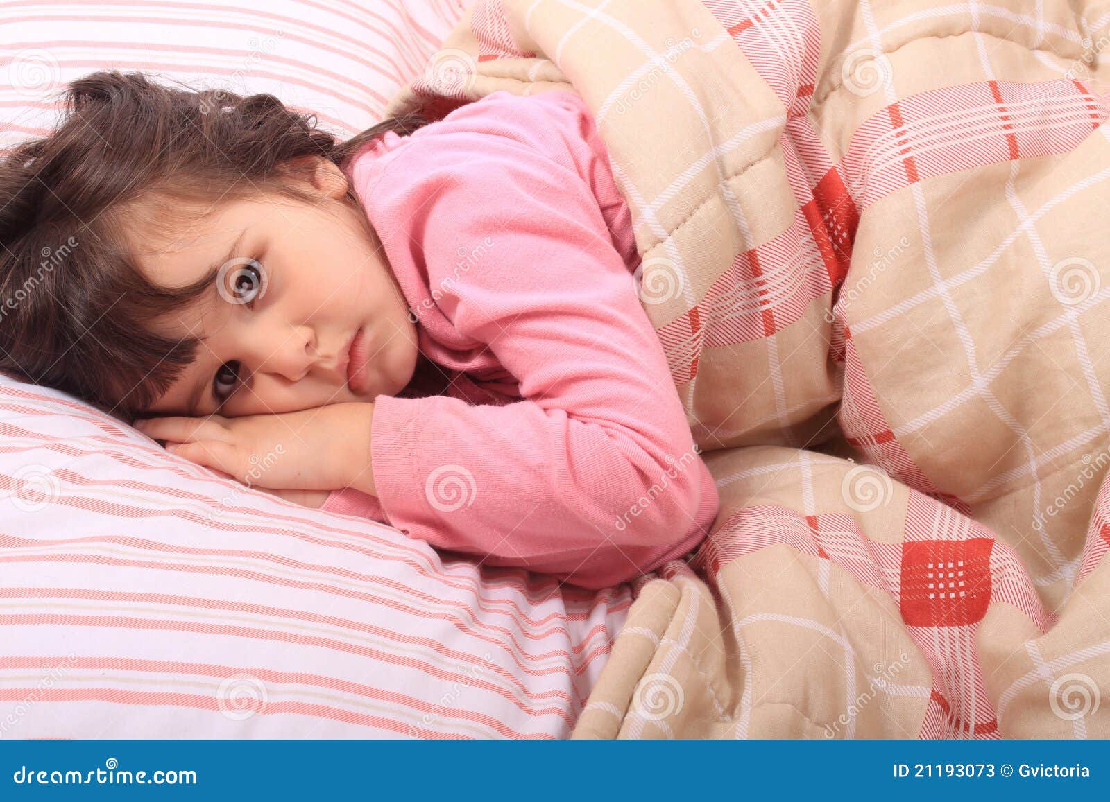 Little girl bedtime stock image. Image of pillow, awake 21193073