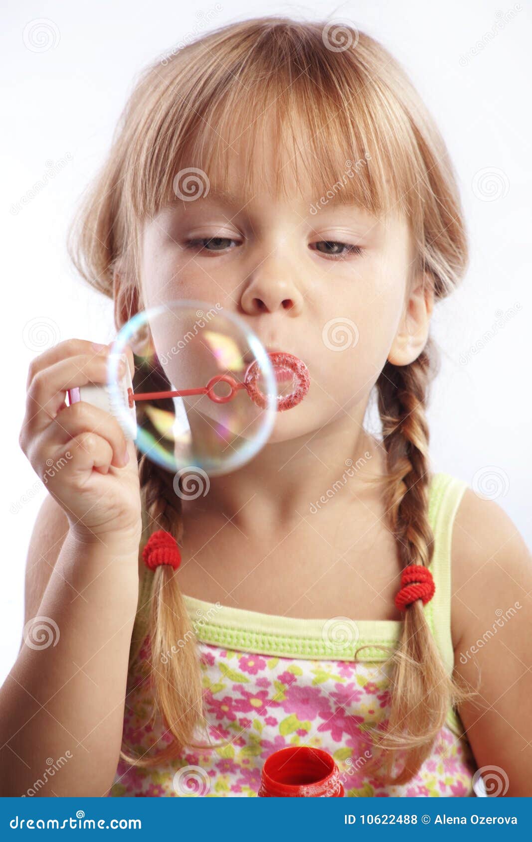 Little Girl Blowing Bubbles Stock Photo - Image: 10622488