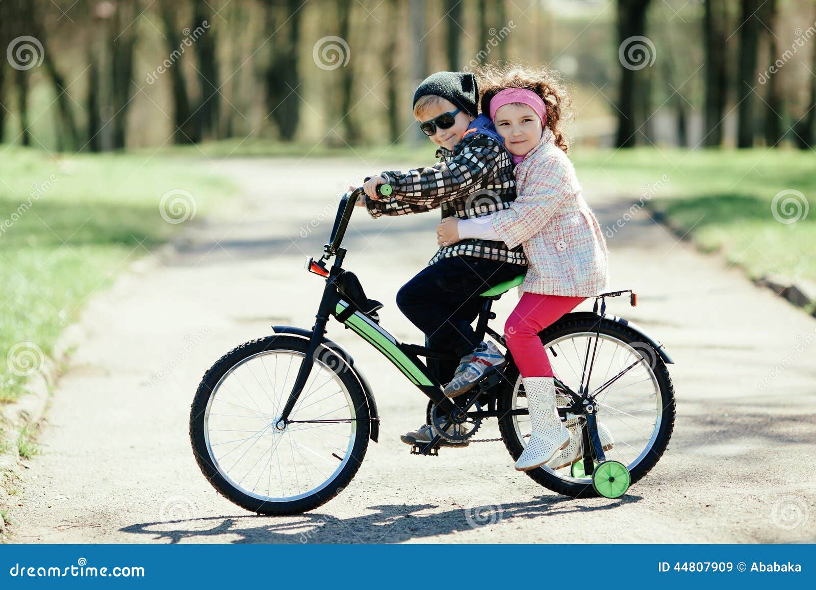 boy and girl bike photo