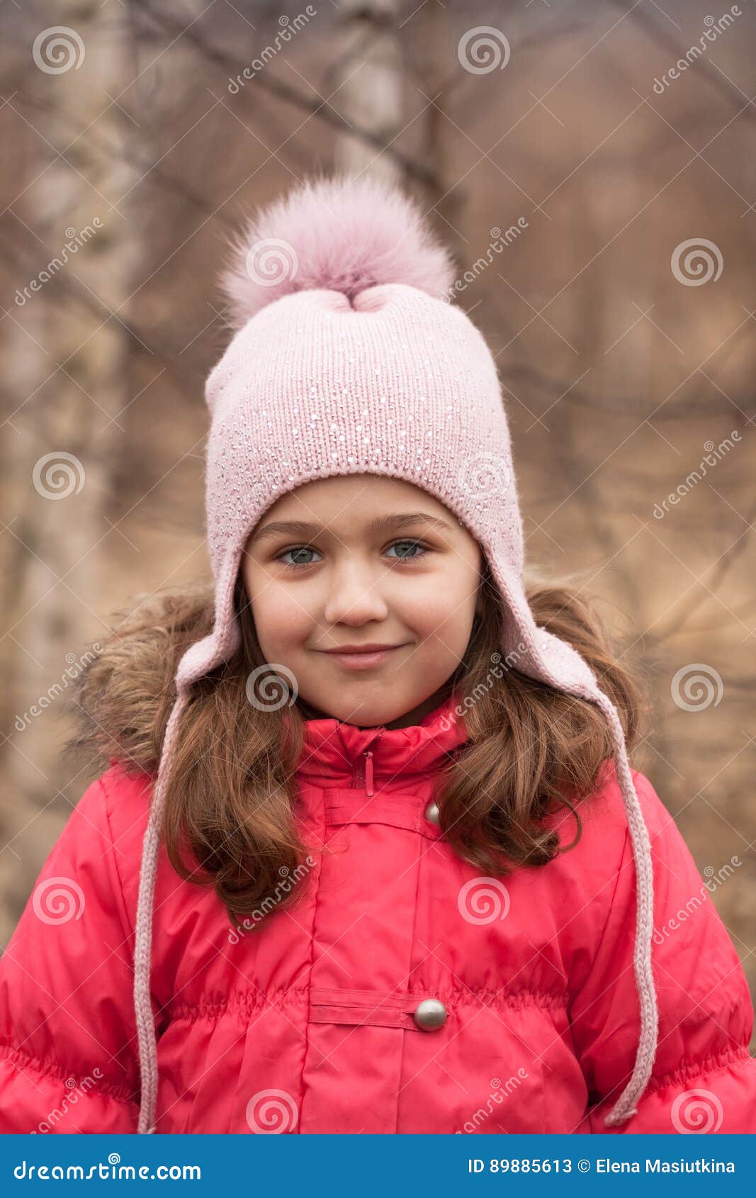 Little Girl in Bright Red Jacket and Knitted Pink Cap on Spring Stock ...