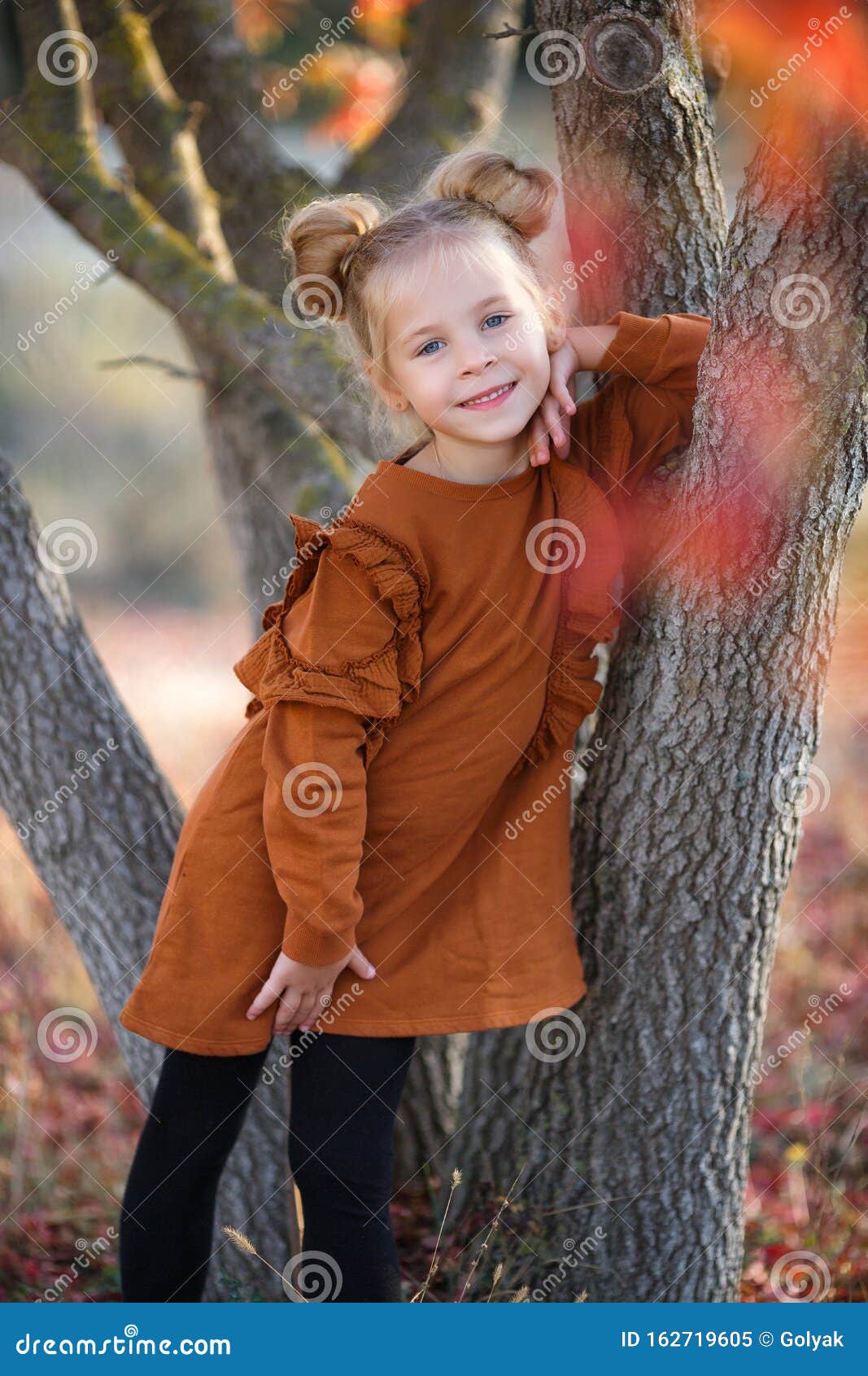 Little Cute Girl Poses Near Big Tree In Summer Park, Shallow Dof Stock  Photo, Picture and Royalty Free Image. Image 70732702.